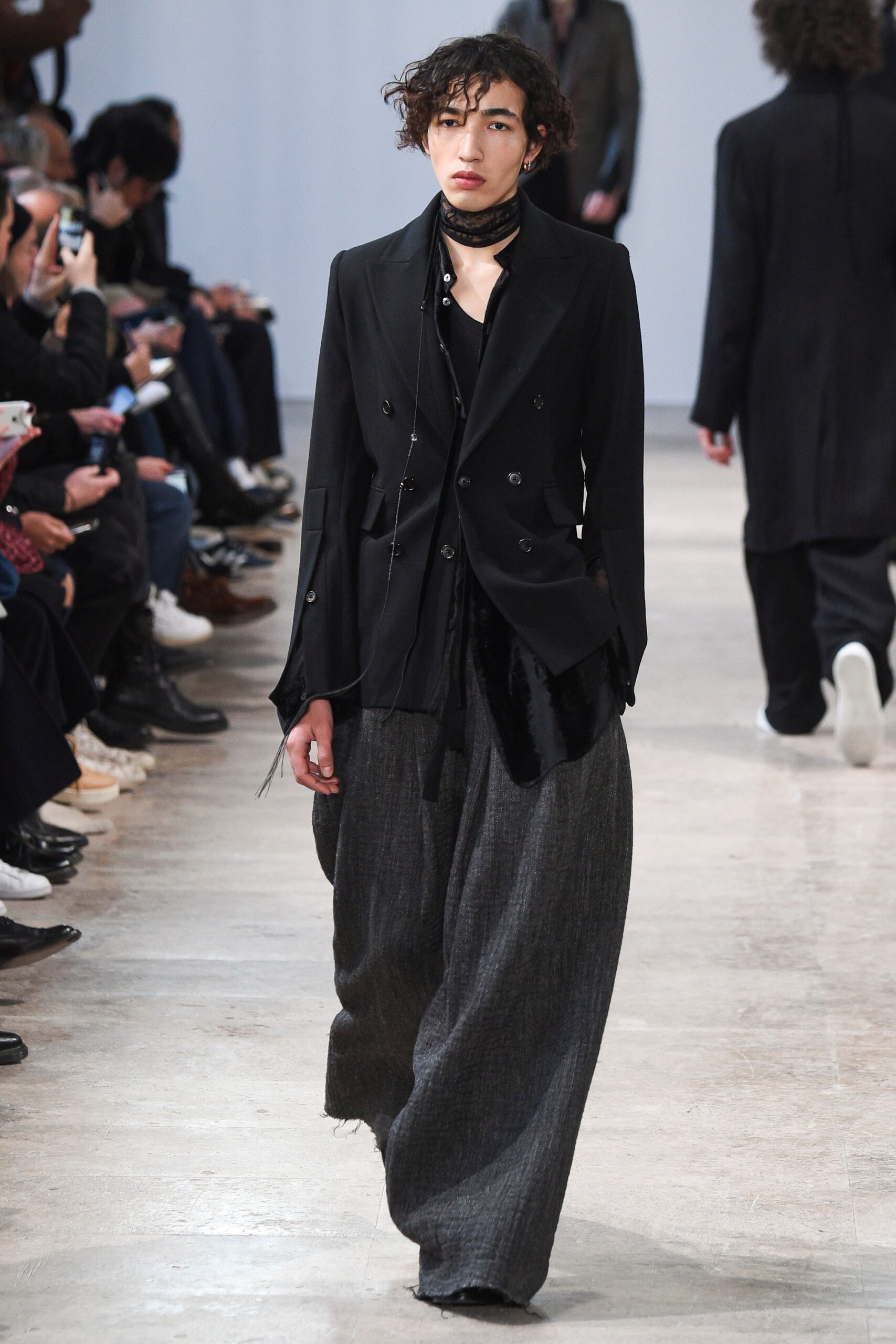 black tailored blazer and gray wide-leg pants