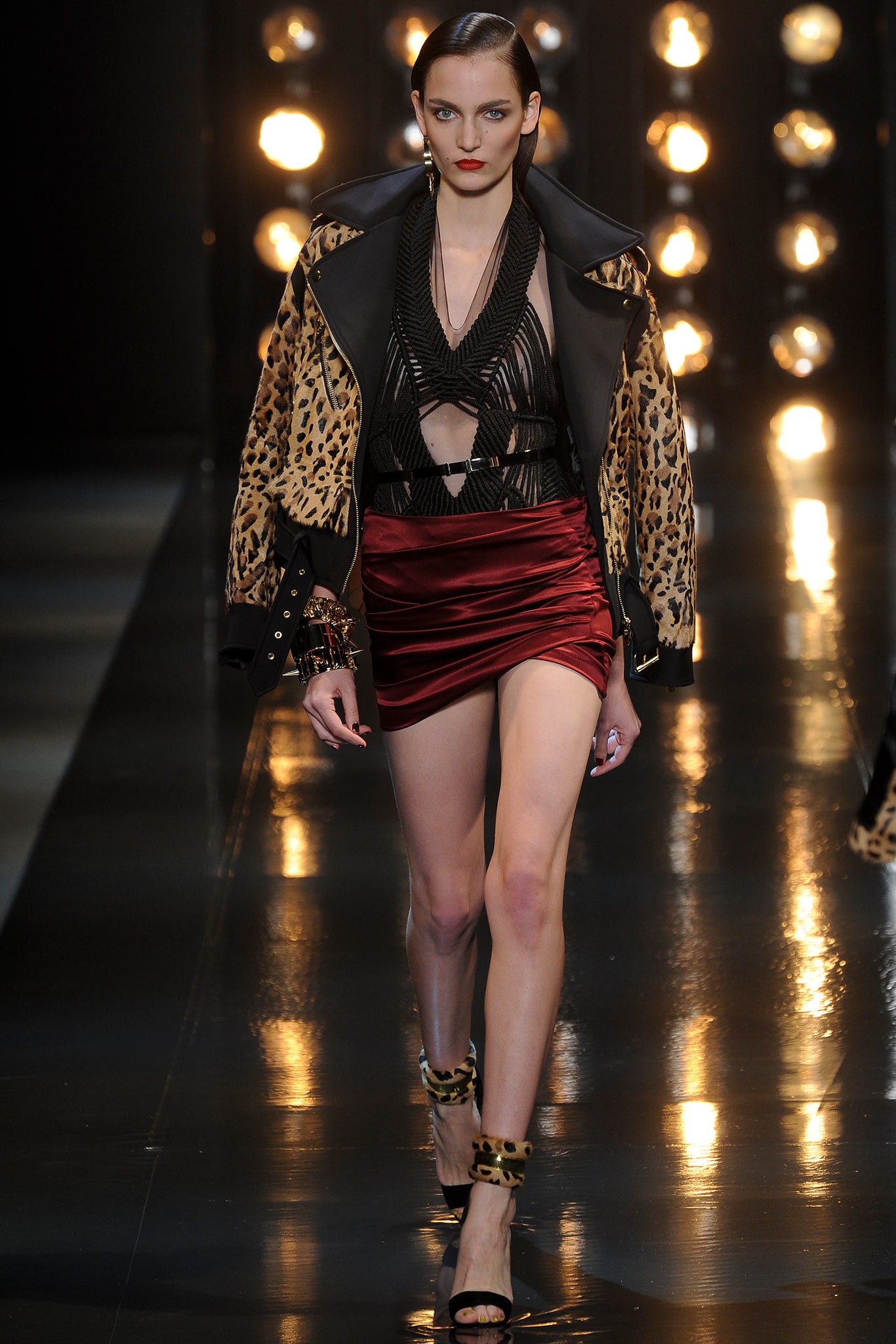 fitted black leather jacket with red satin skirt