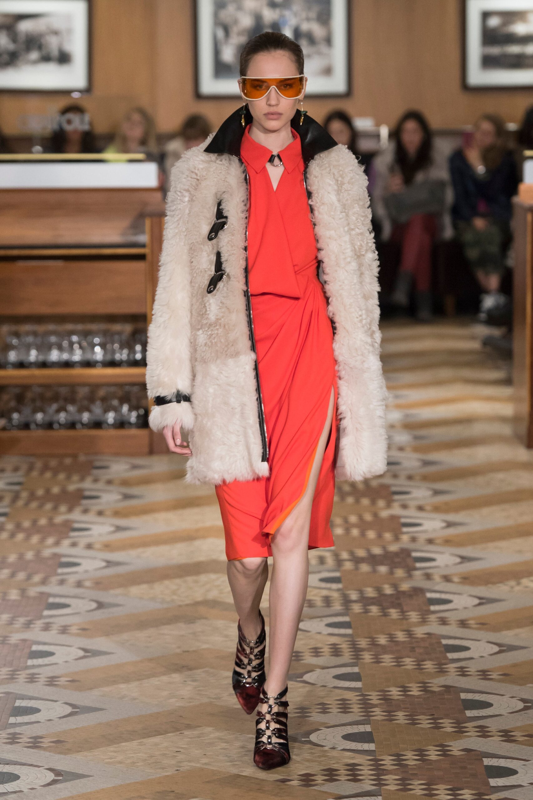 white faux-fur coat and red dress