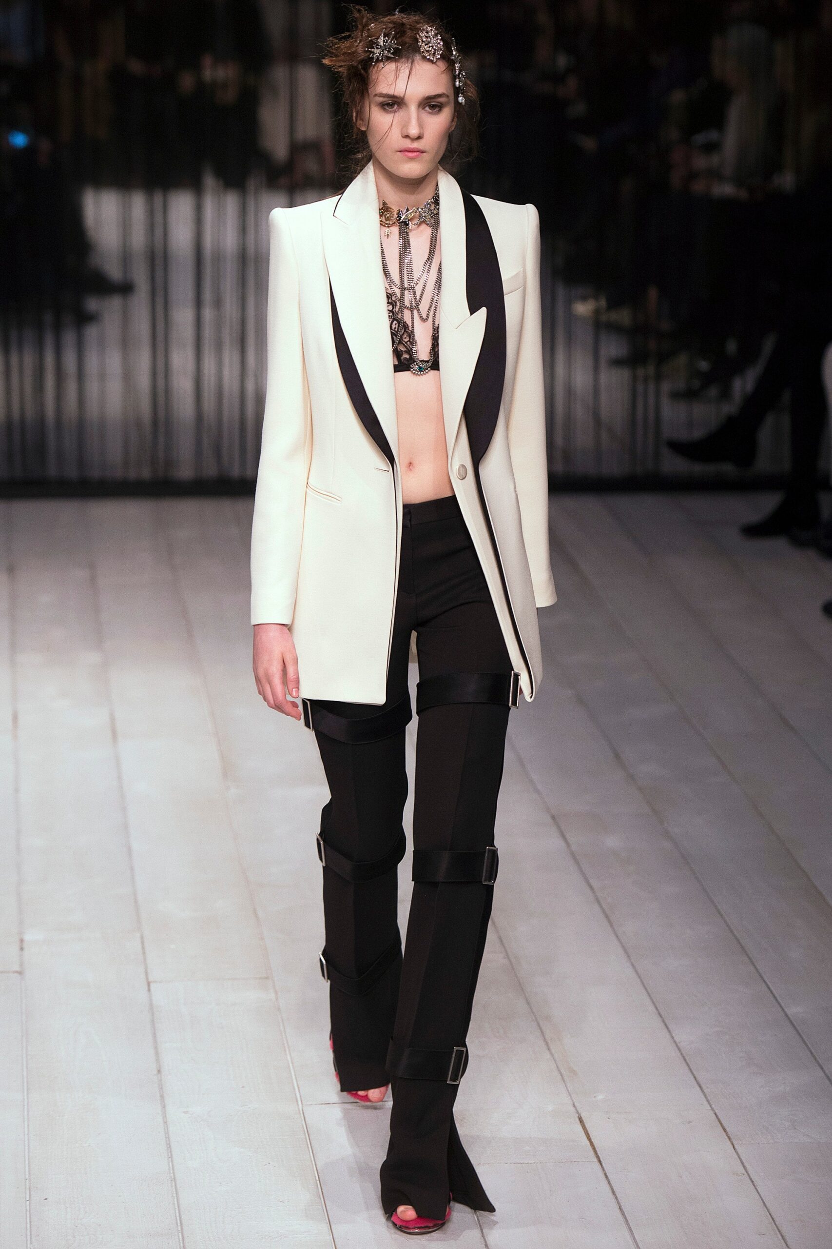 tailored white blazer and fitted black pants