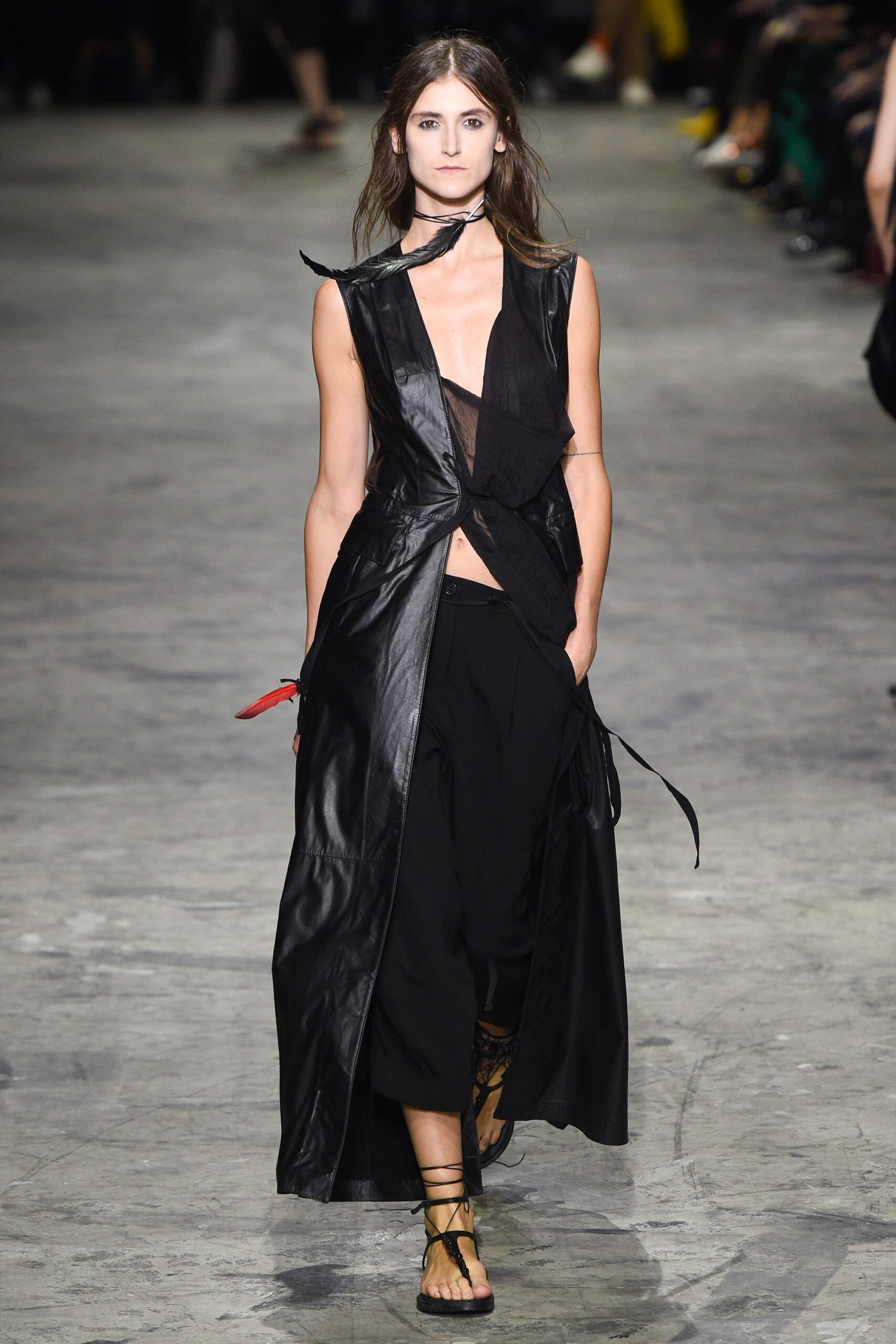 black leather sleeveless dress and relaxed pants