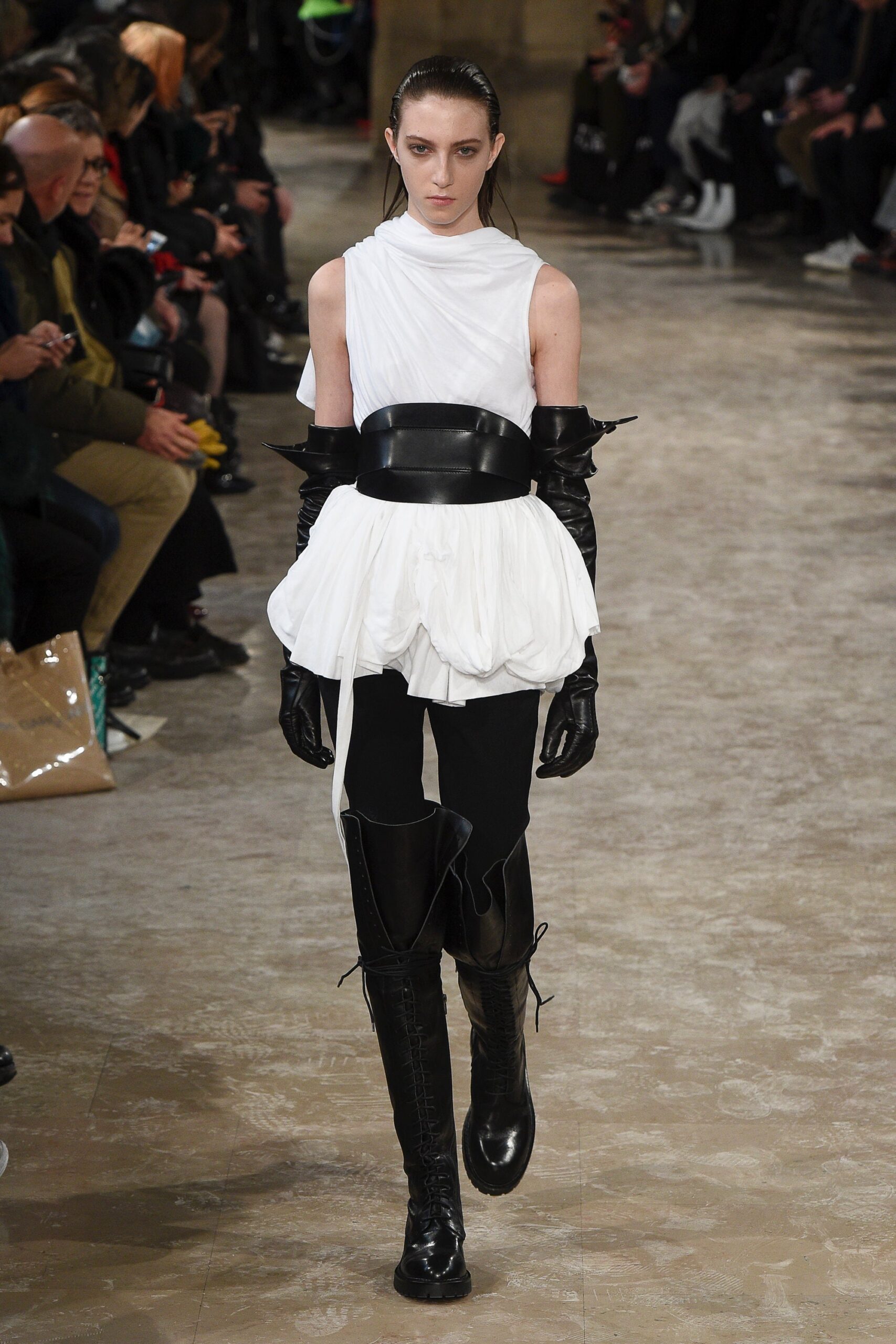 white asymmetric top with black pants