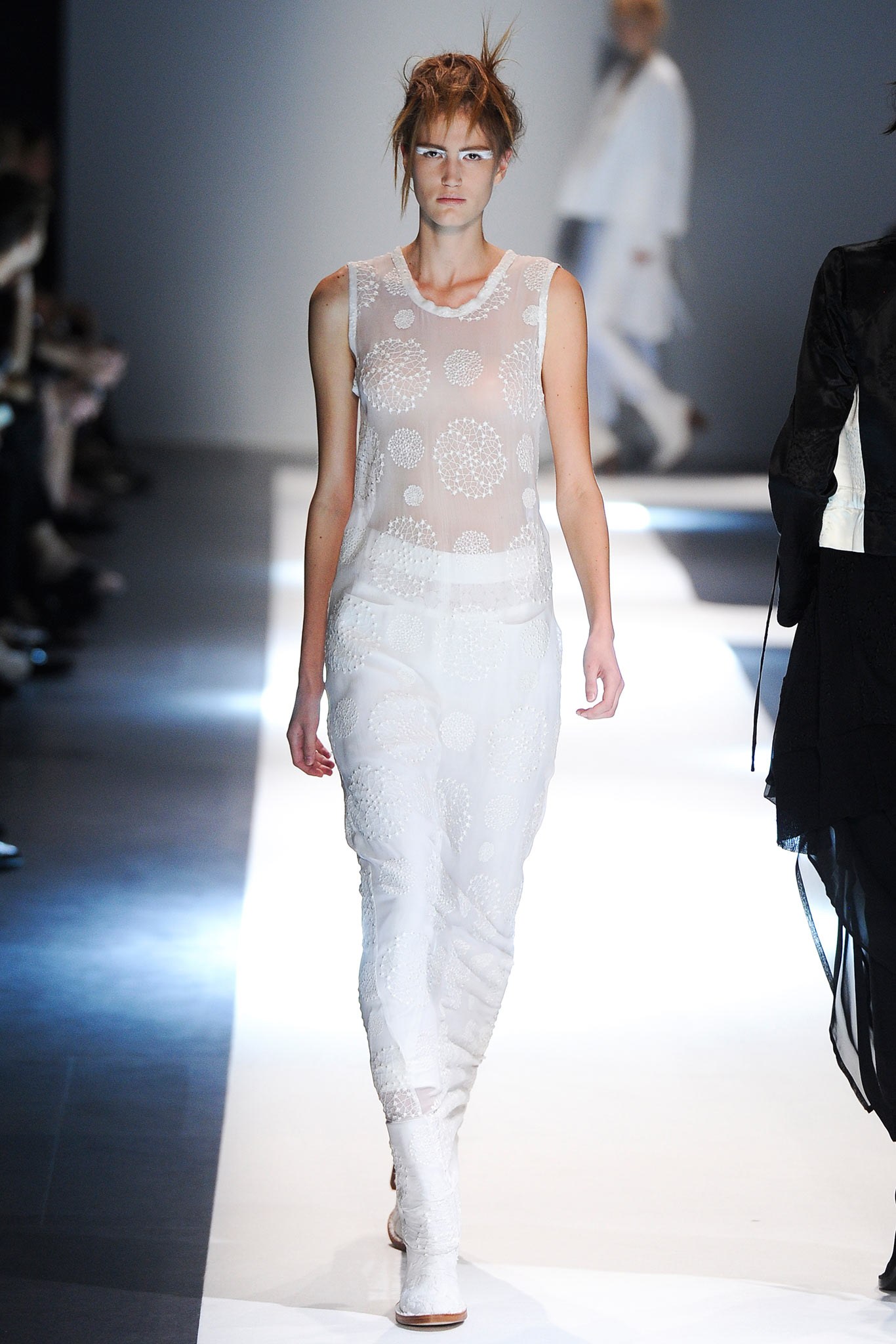 white sheer top and relaxed pants