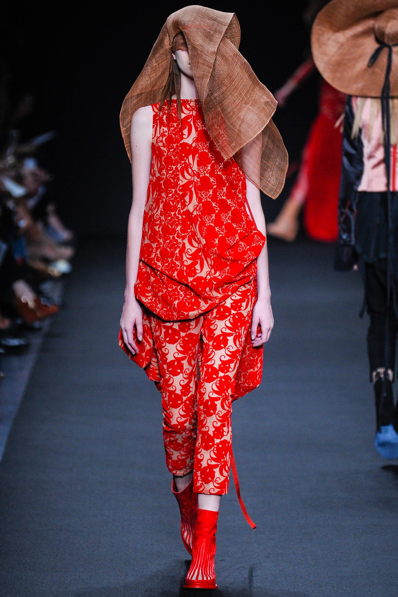 red relaxed top with printed pants