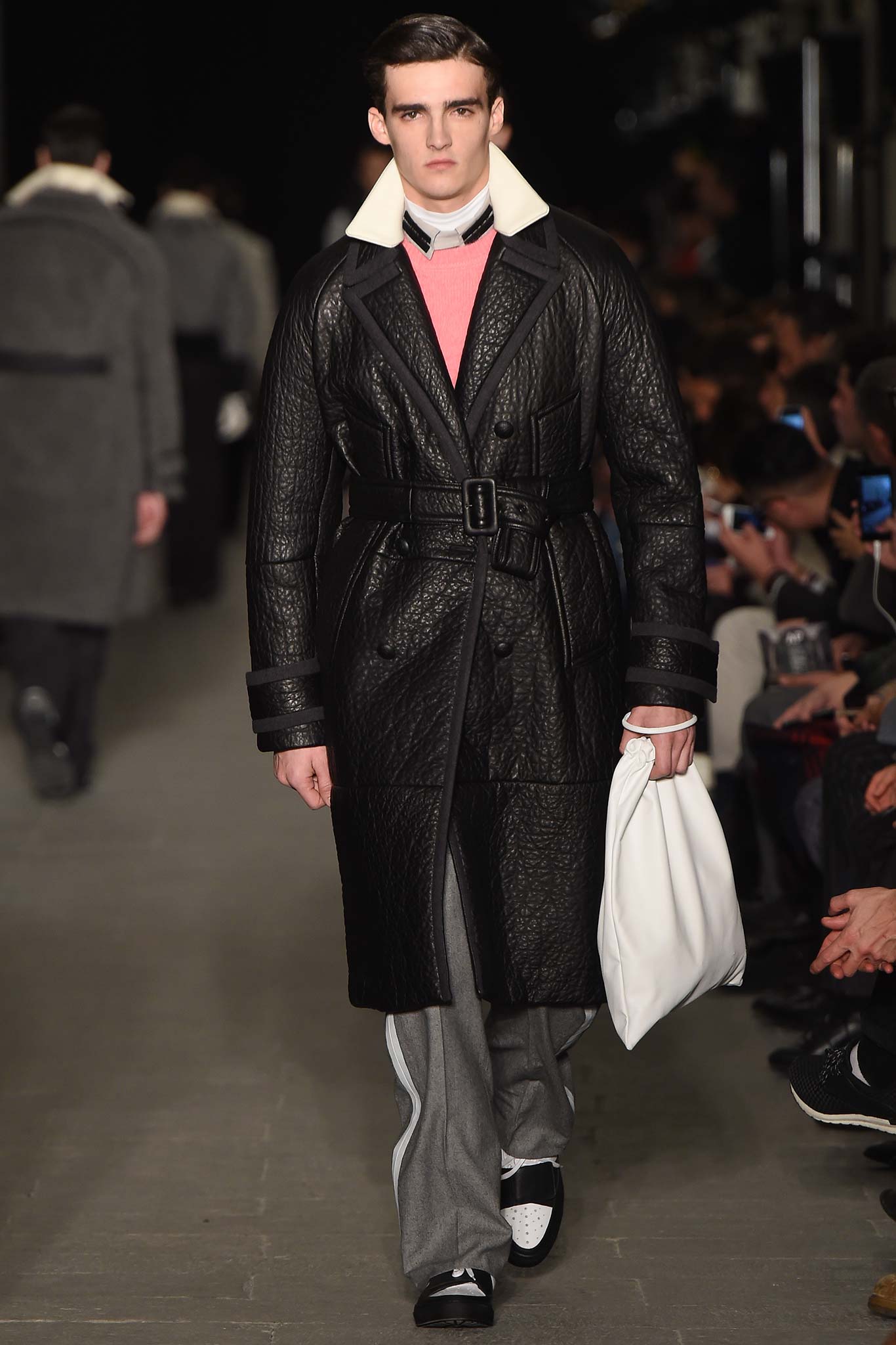 black leather long-sleeve collared fitted belted coat