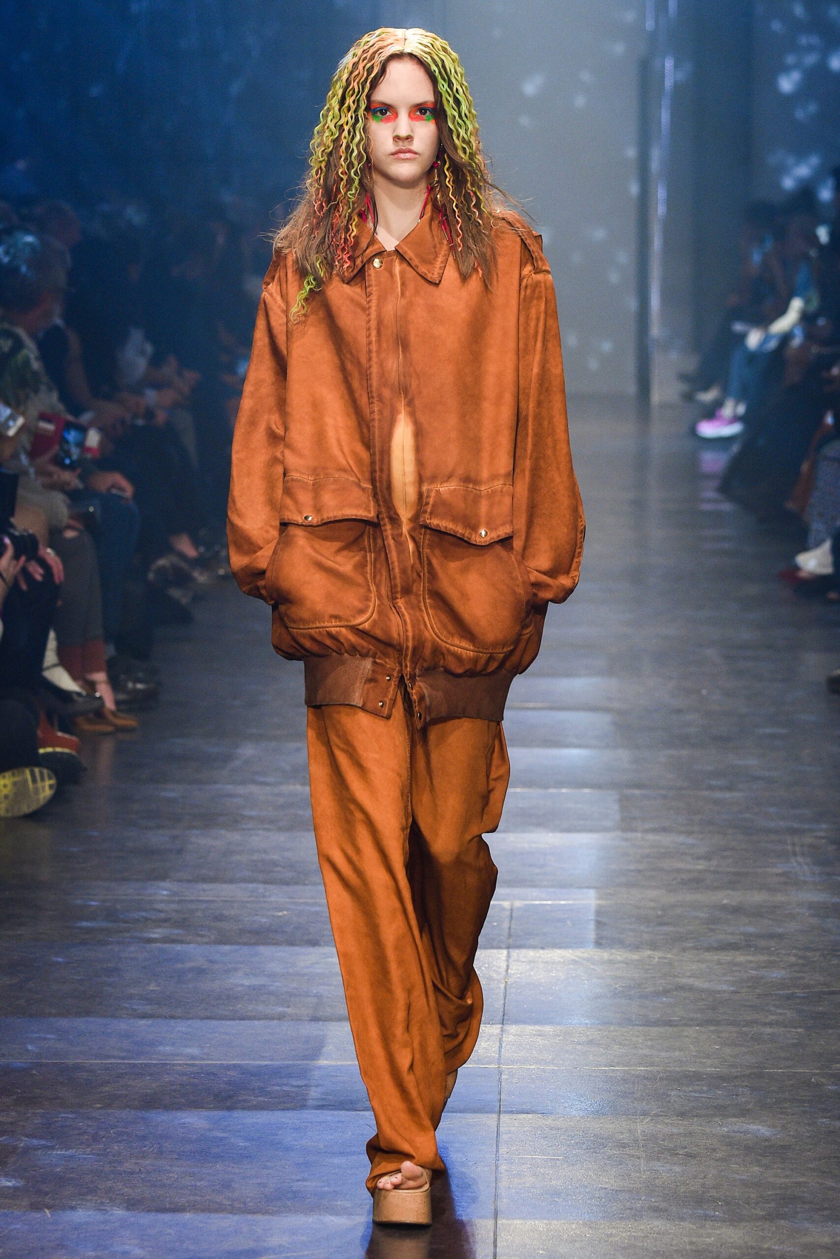 brown leather oversized jacket and relaxed pants