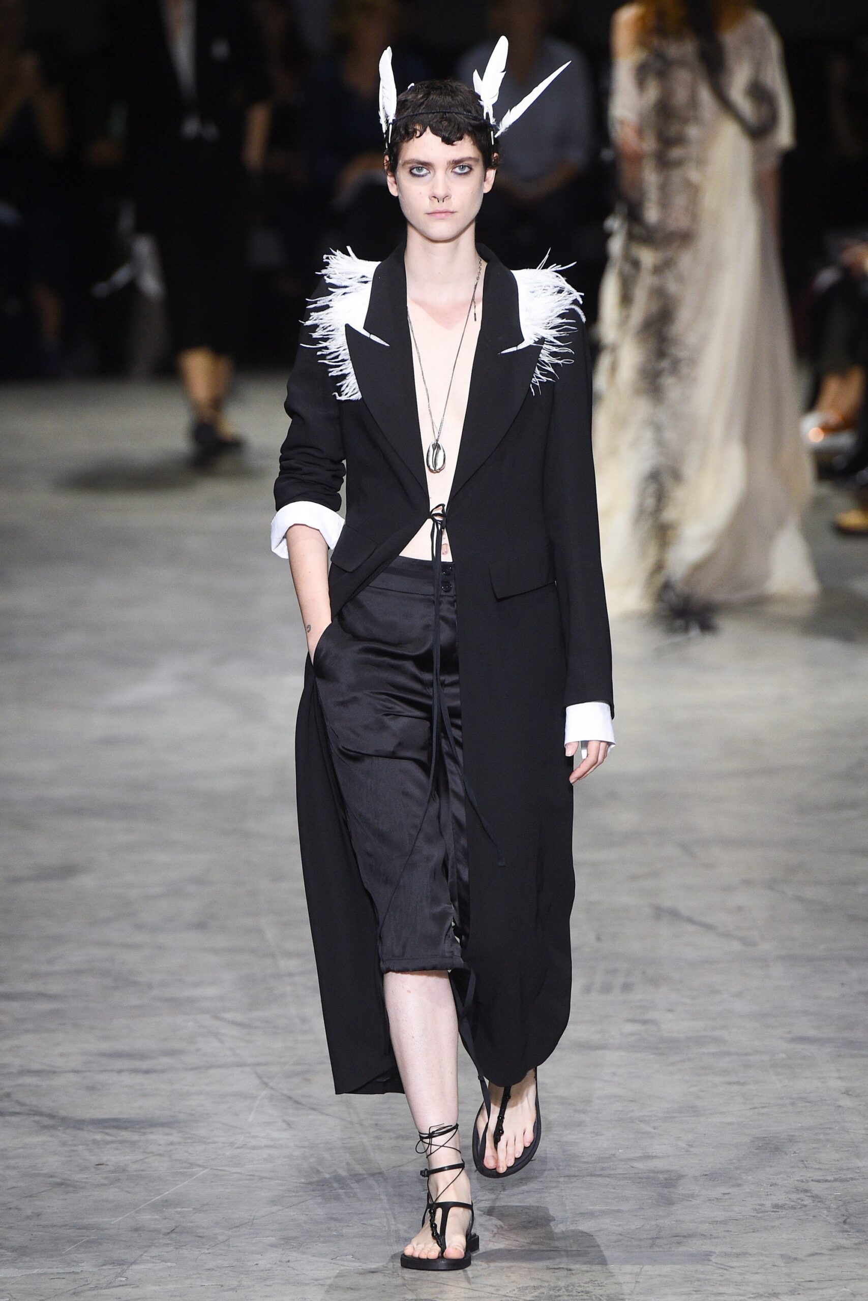 black wool coat with white top