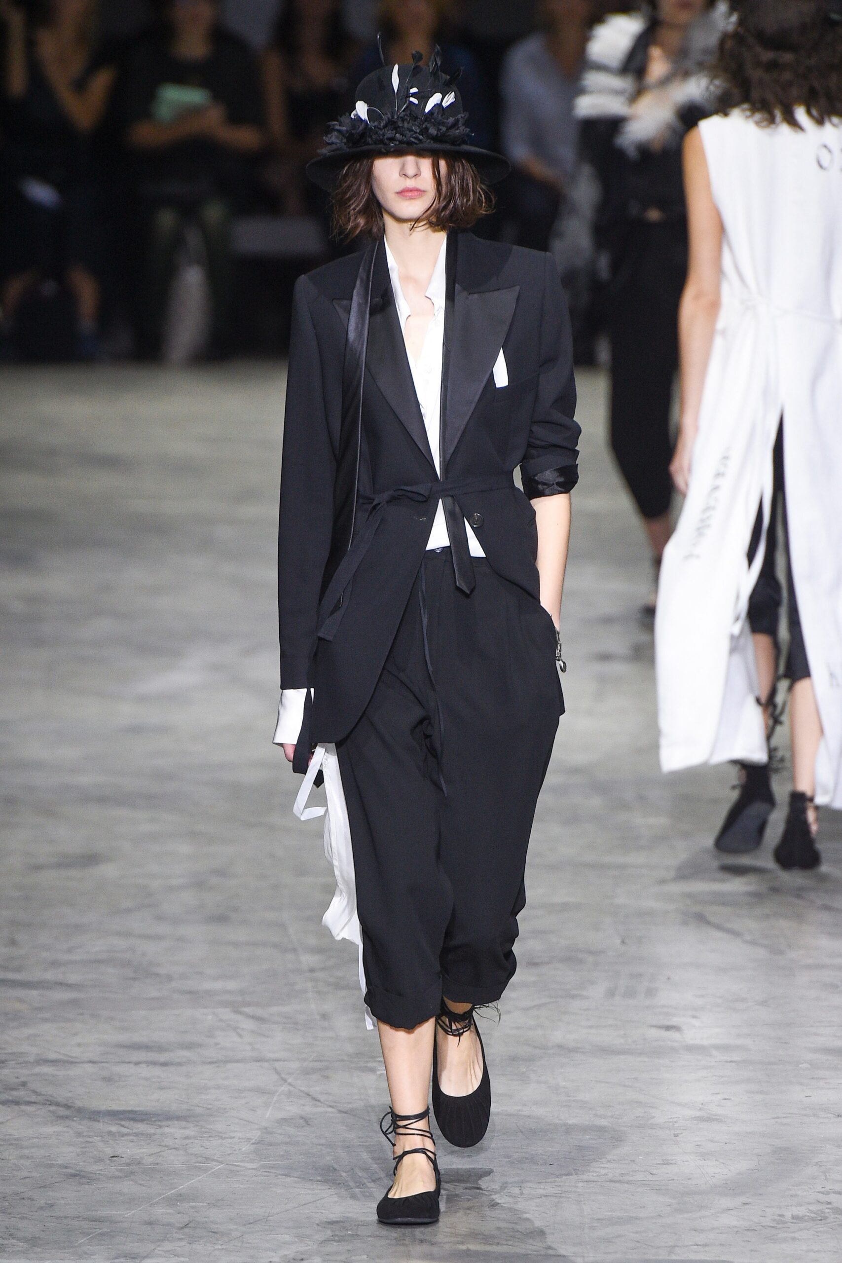 black tailored blazer and relaxed pants