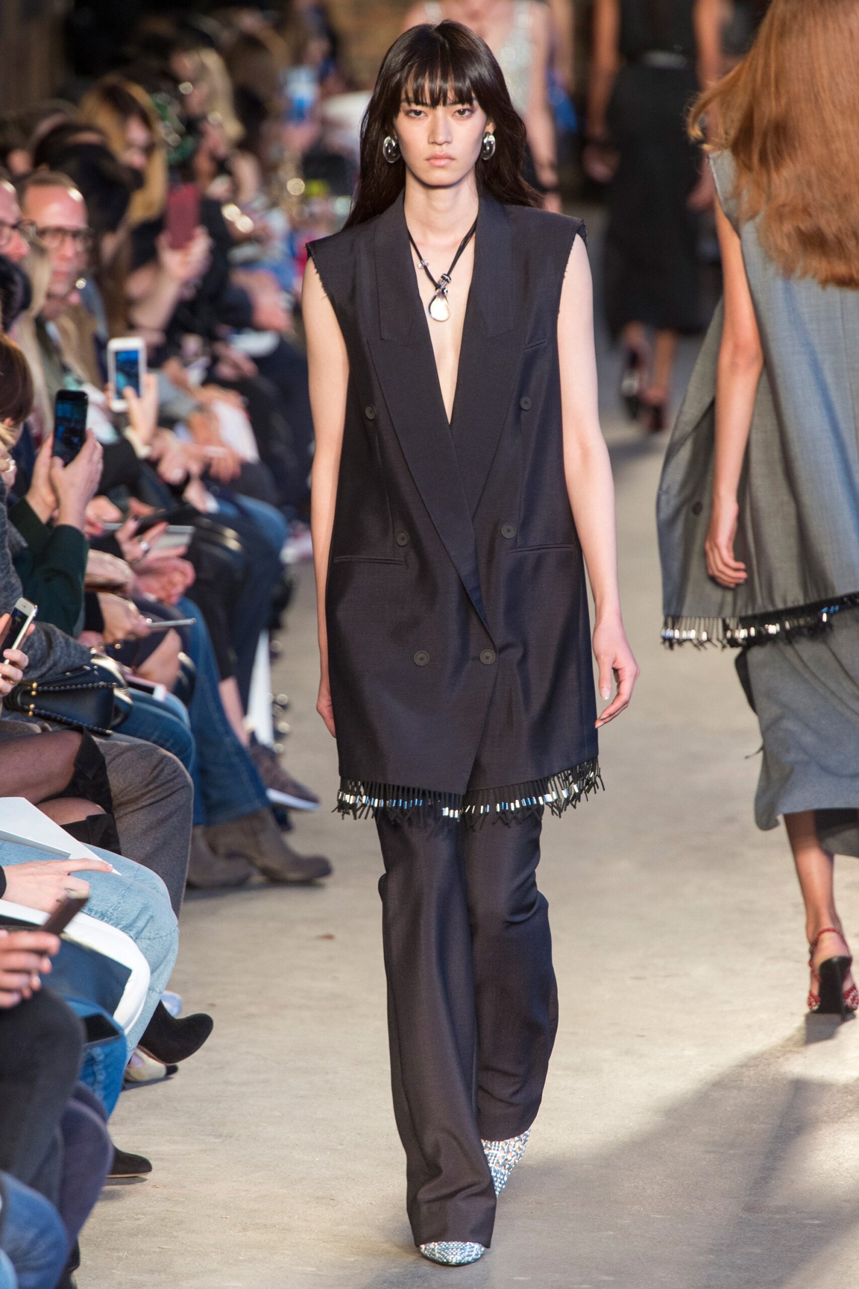 black wool sleeveless v-neck fitted buttoned fringed blazer