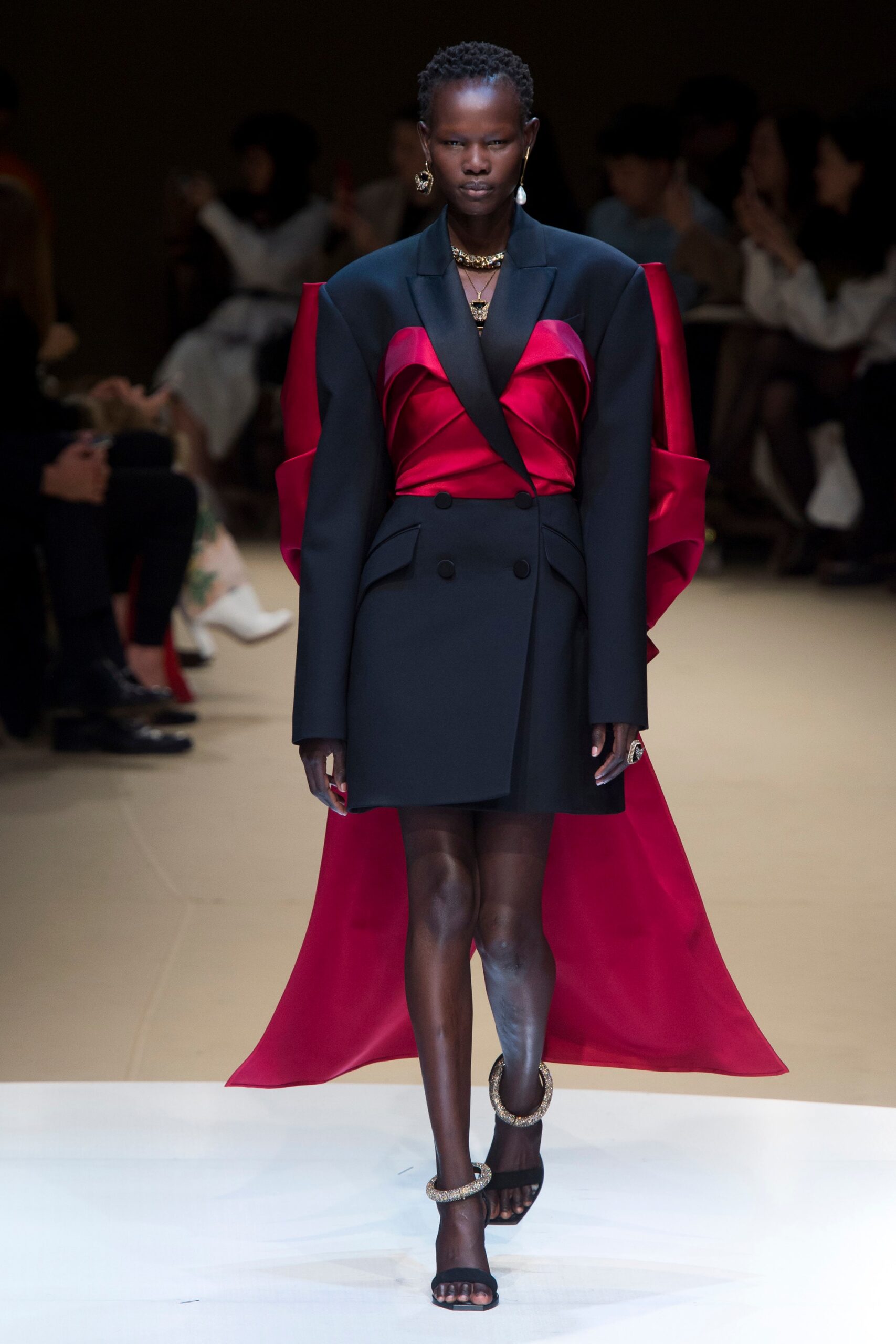 black long-sleeve collared fitted draped layered blazer