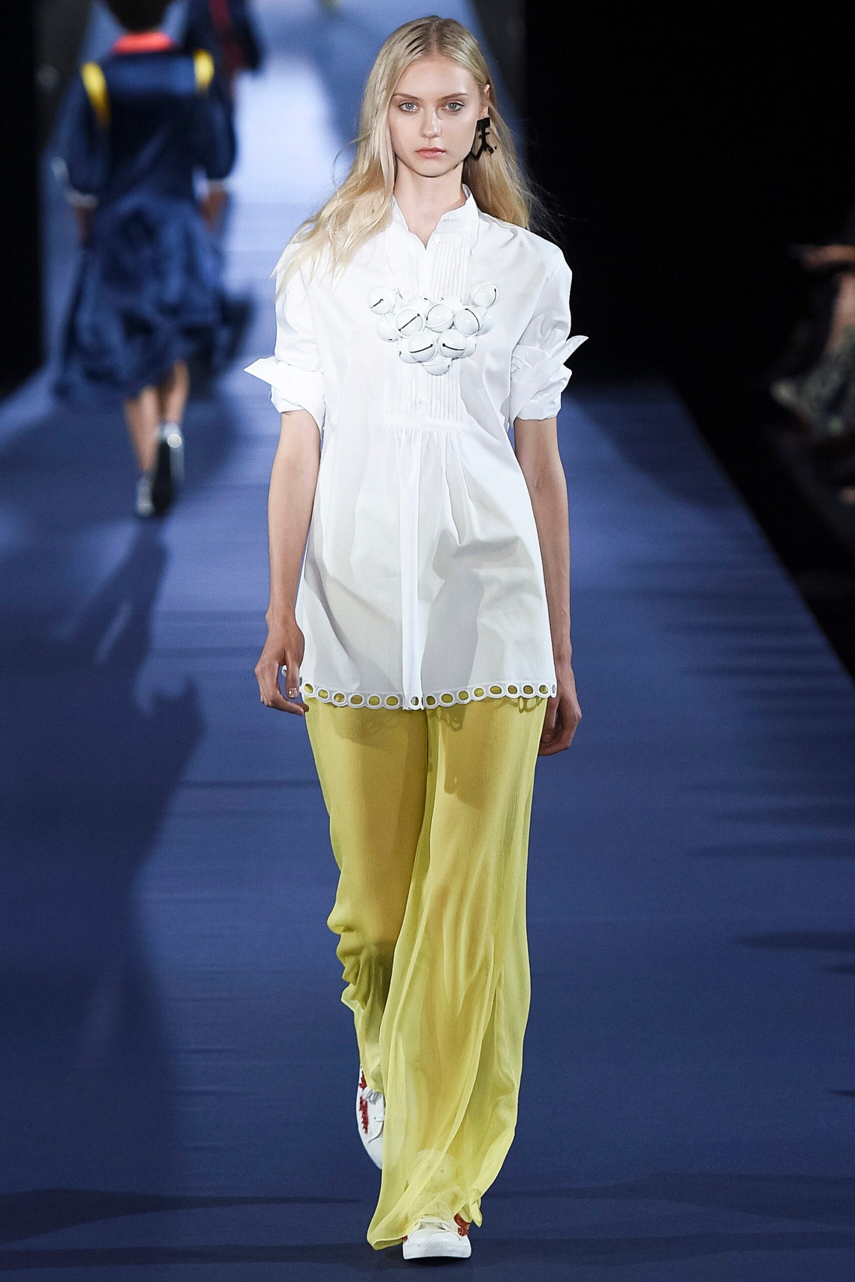 white fitted shirt with yellow pants