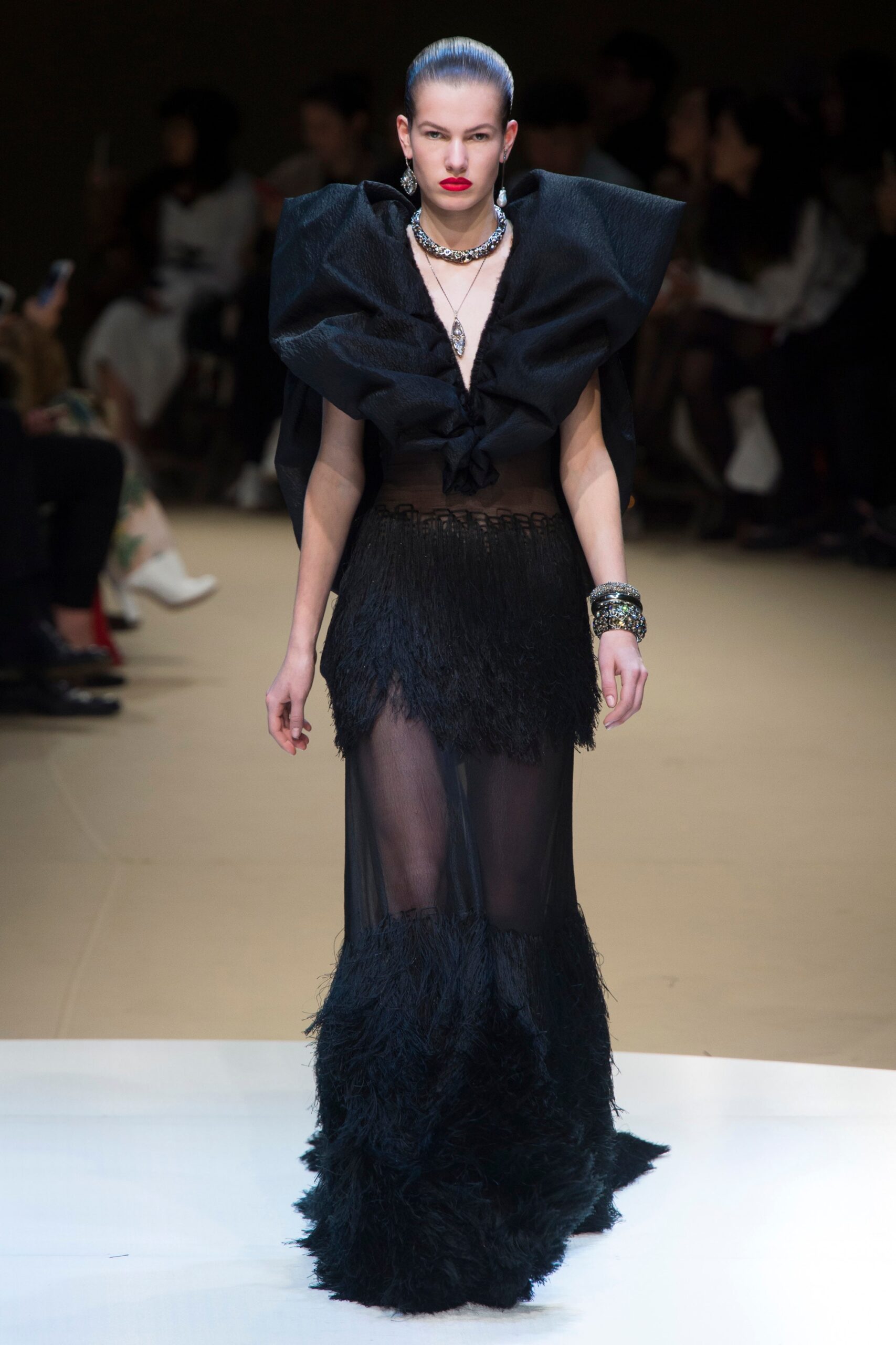 black sheer fringed gown