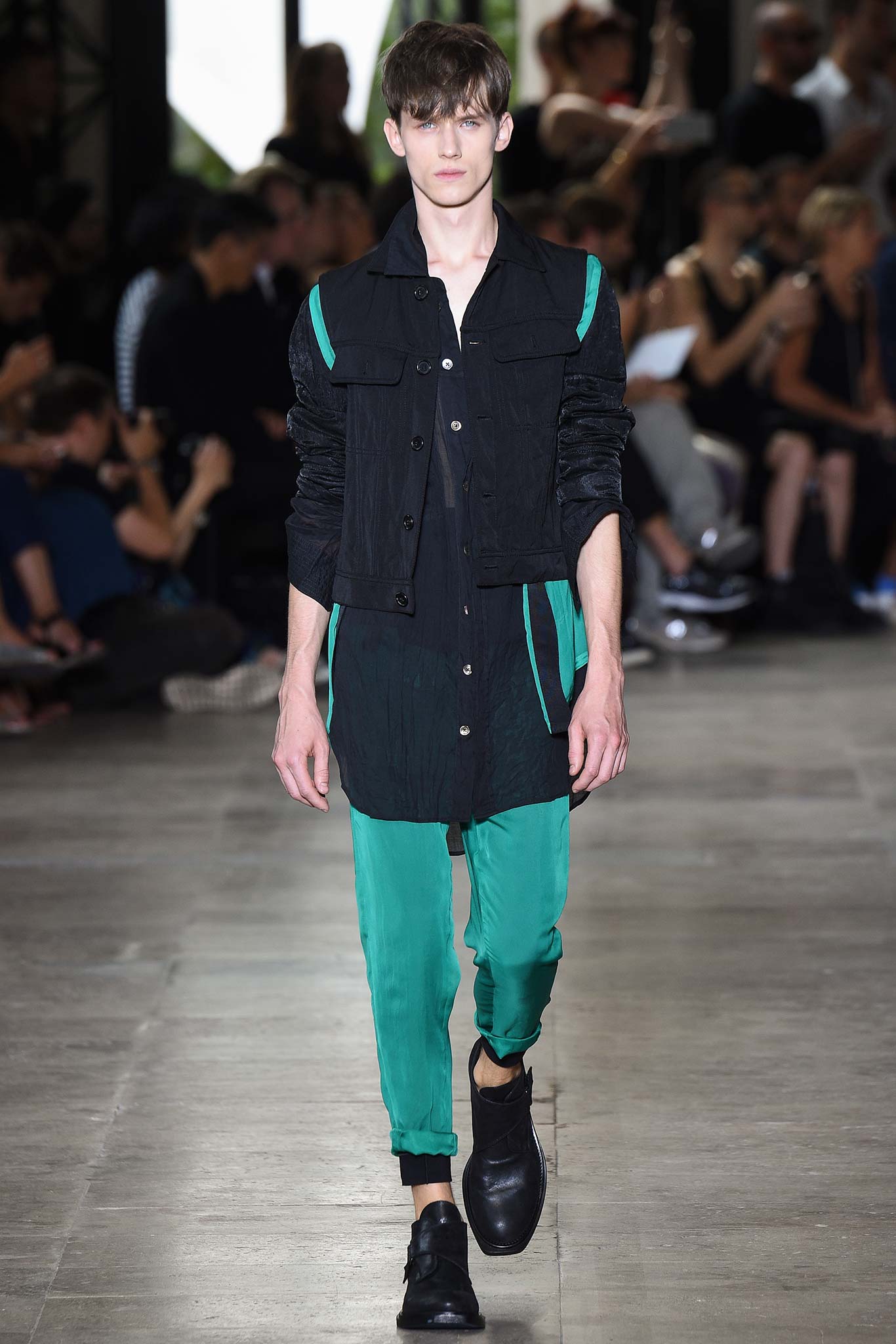 black fitted jacket with green pants