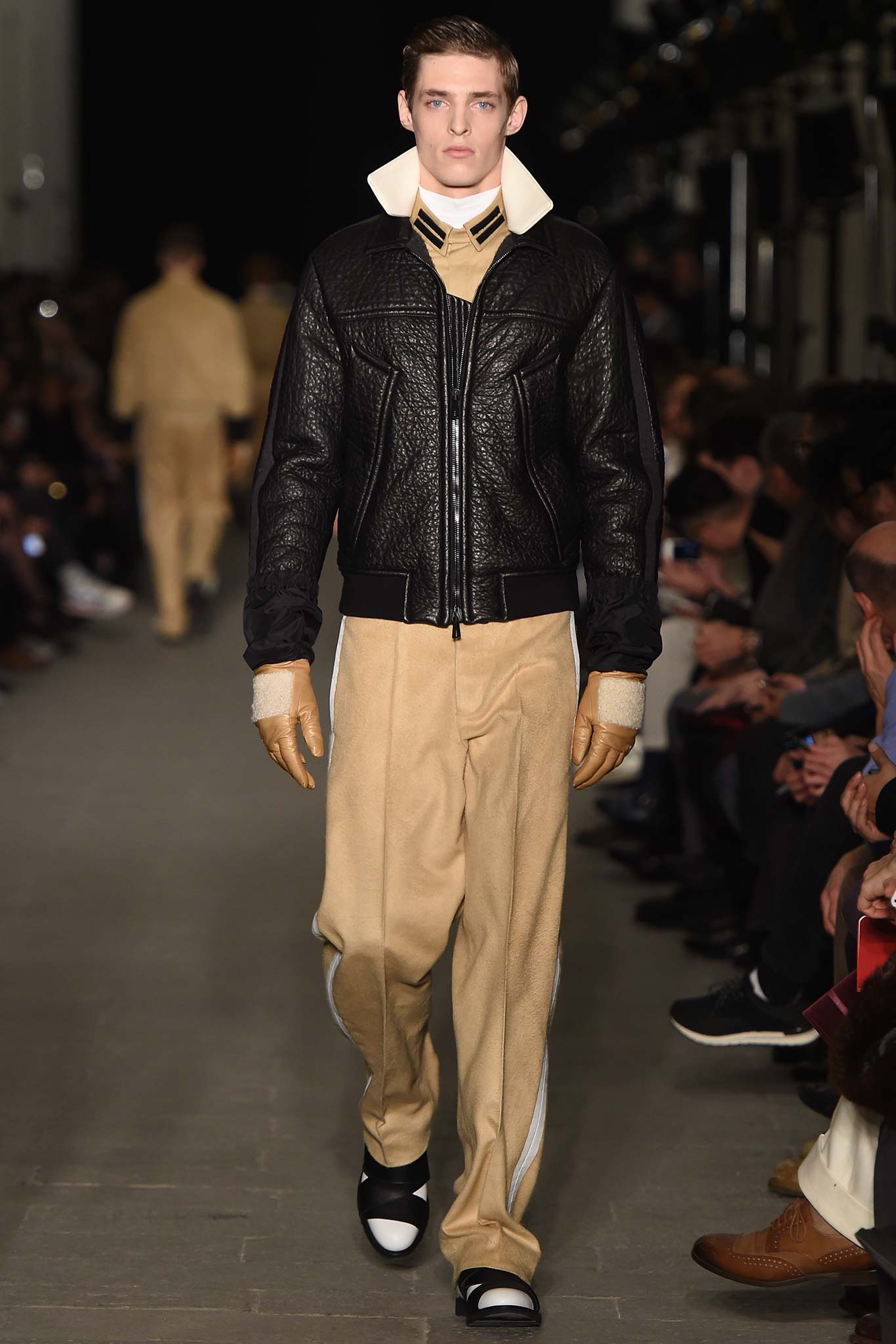 black leather long-sleeve collared fitted zippered jacket