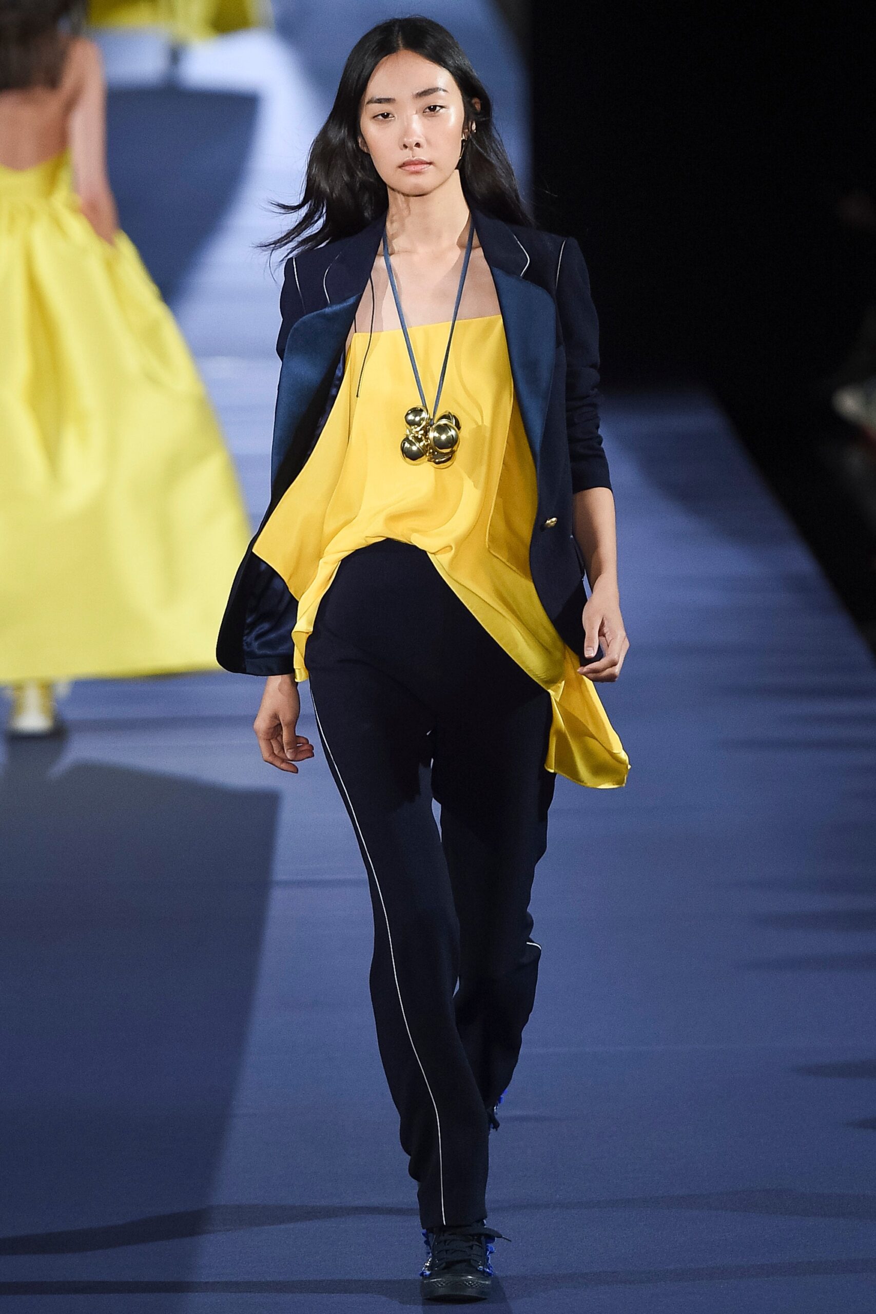 black tailored blazer yellow top