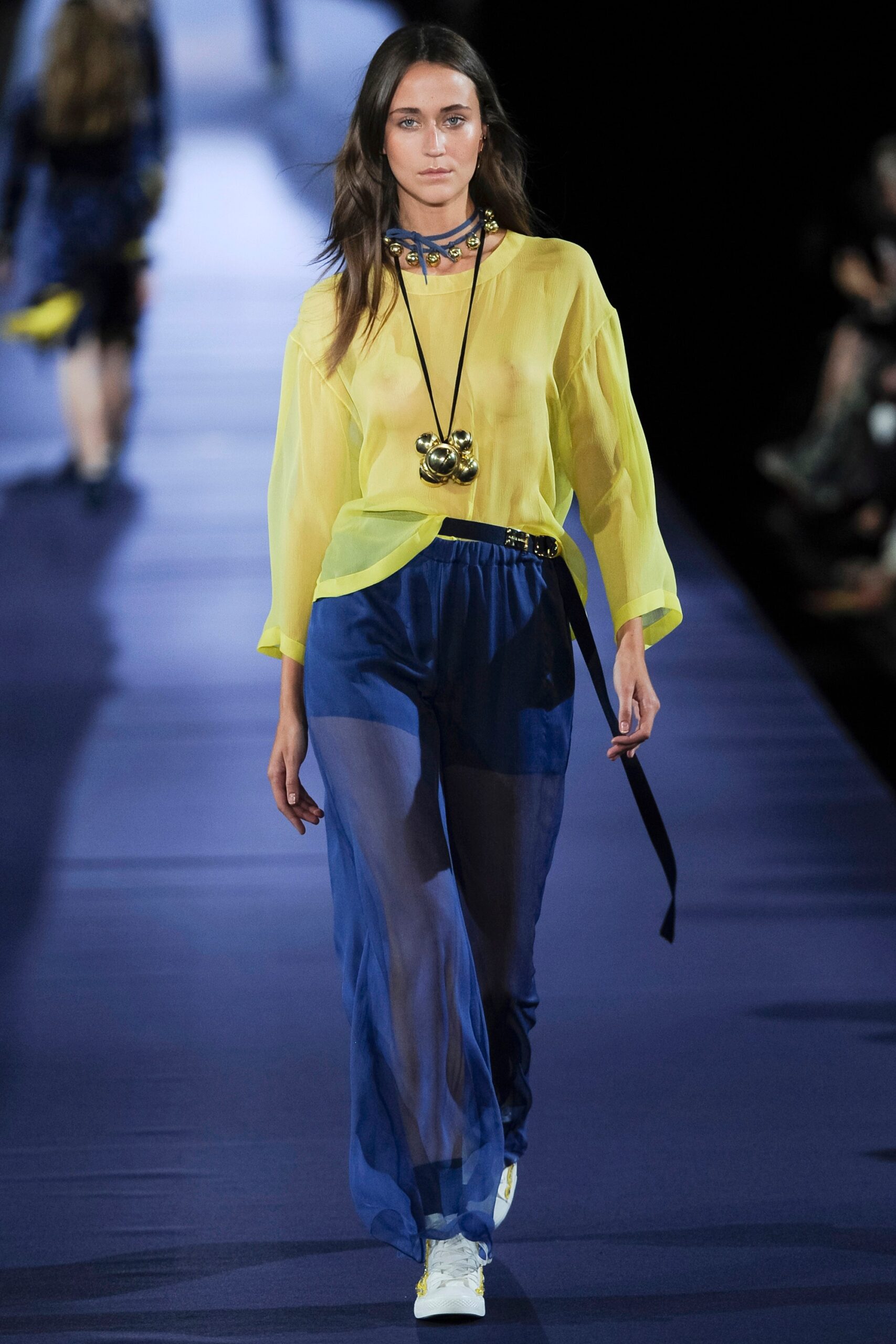 yellow chiffon top blue pants