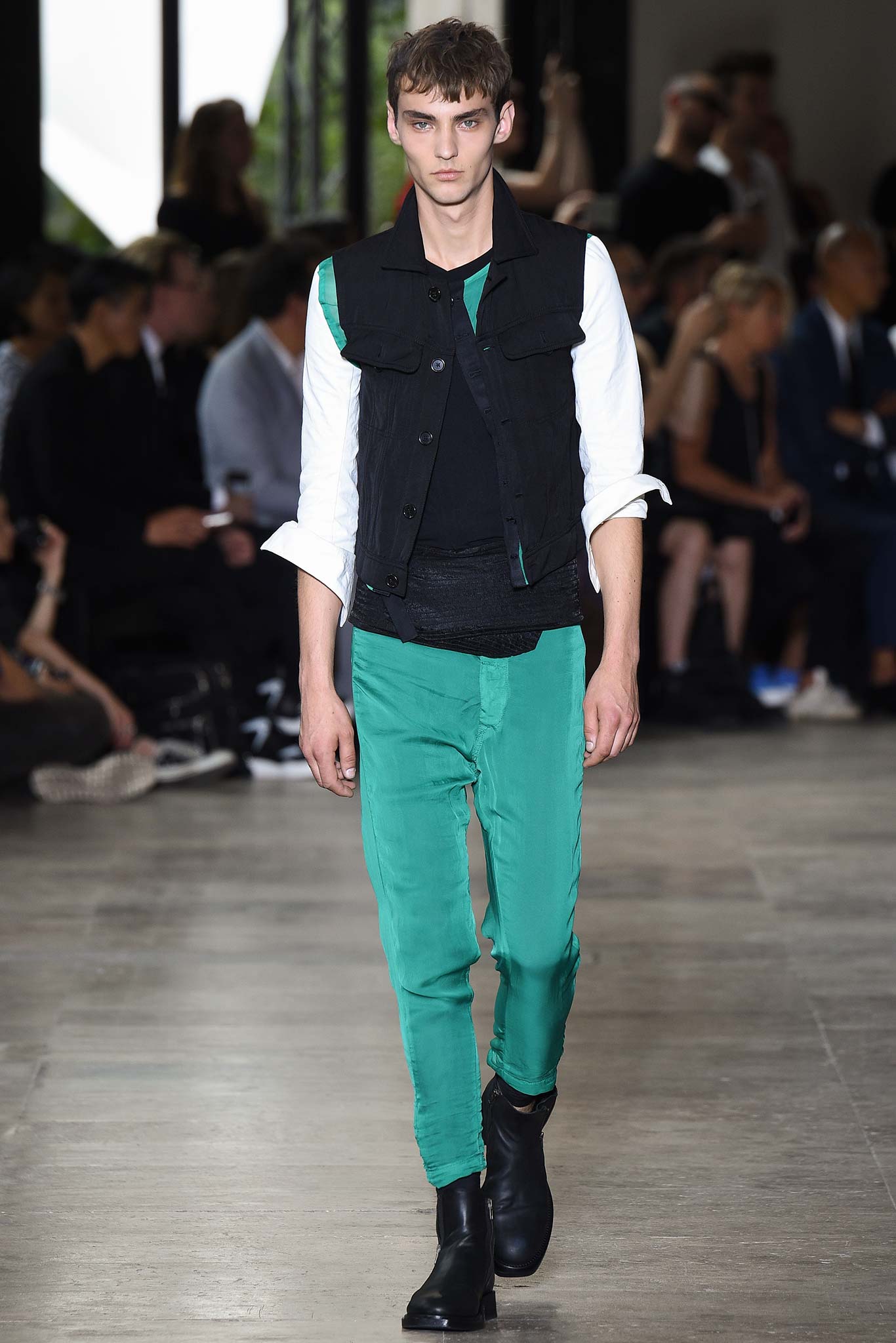 black vest white shirt green pants