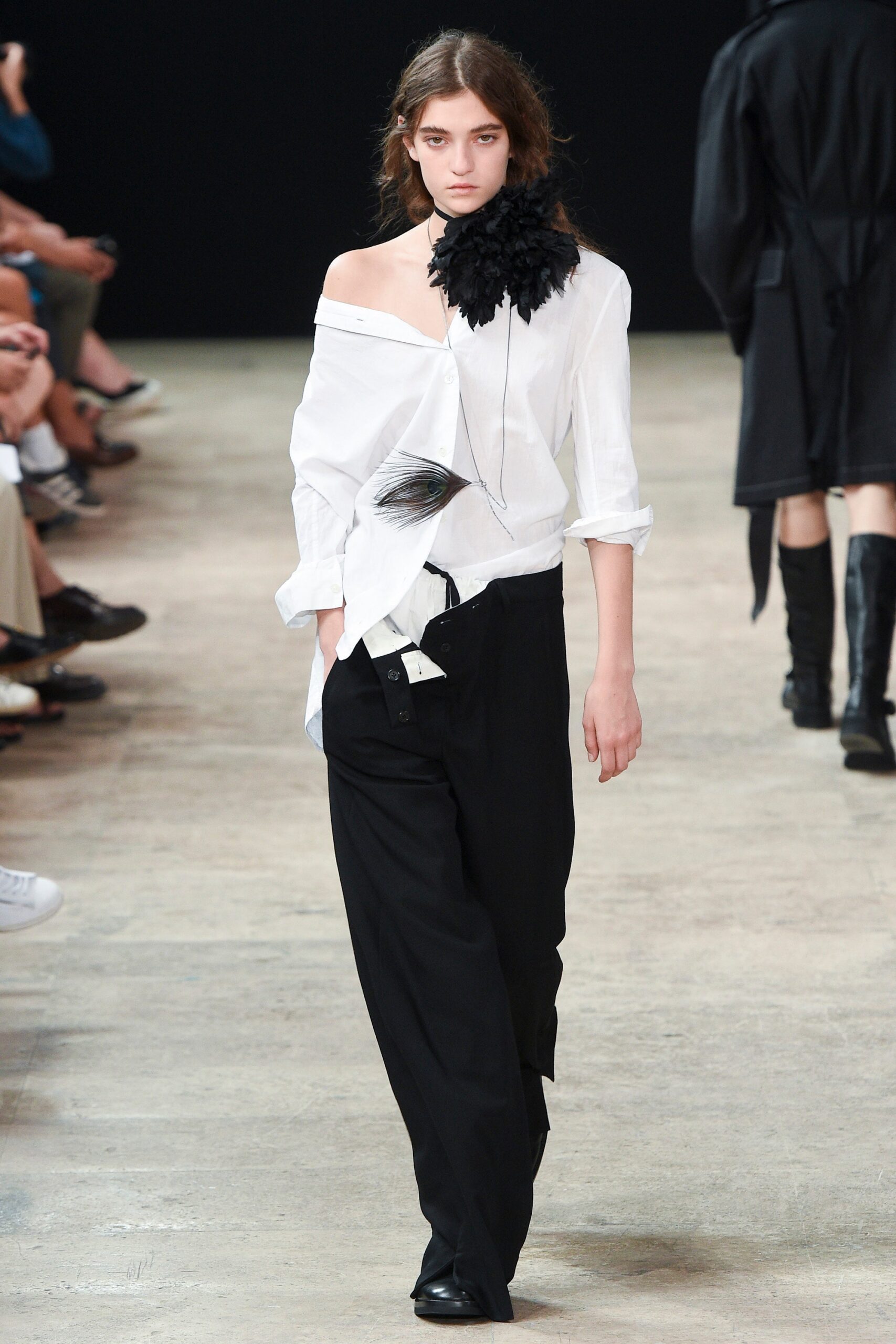 white relaxed shirt and black pants