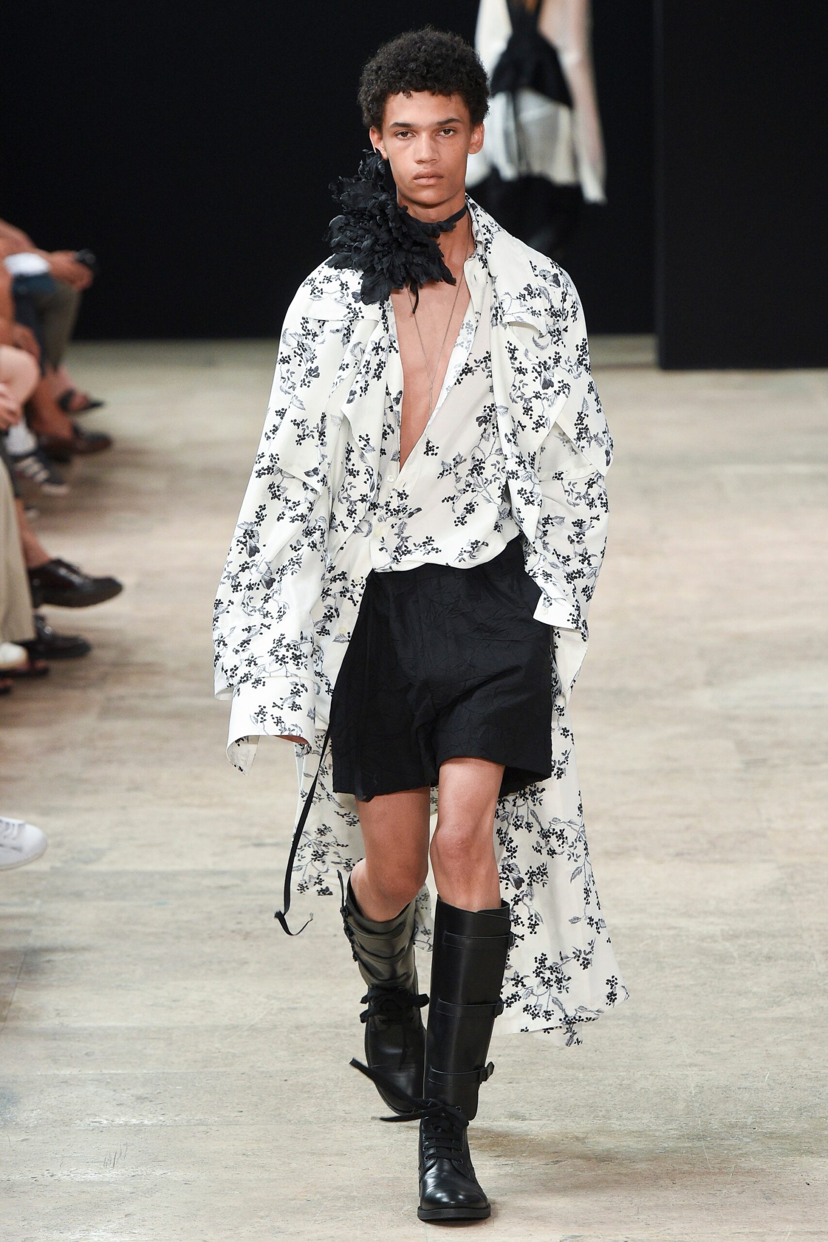 floral shirt with black shorts