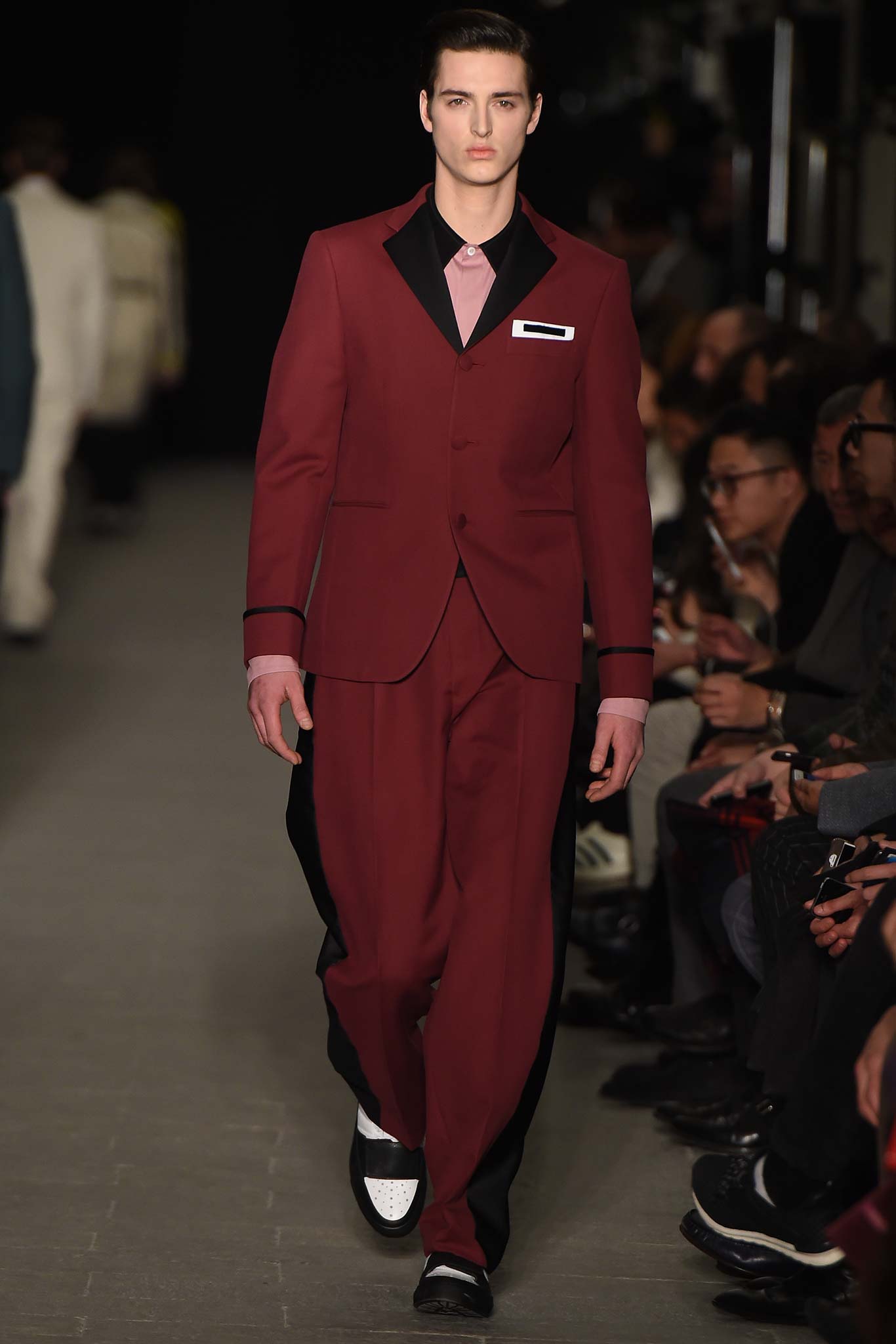 maroon tailored suit with pink shirt
