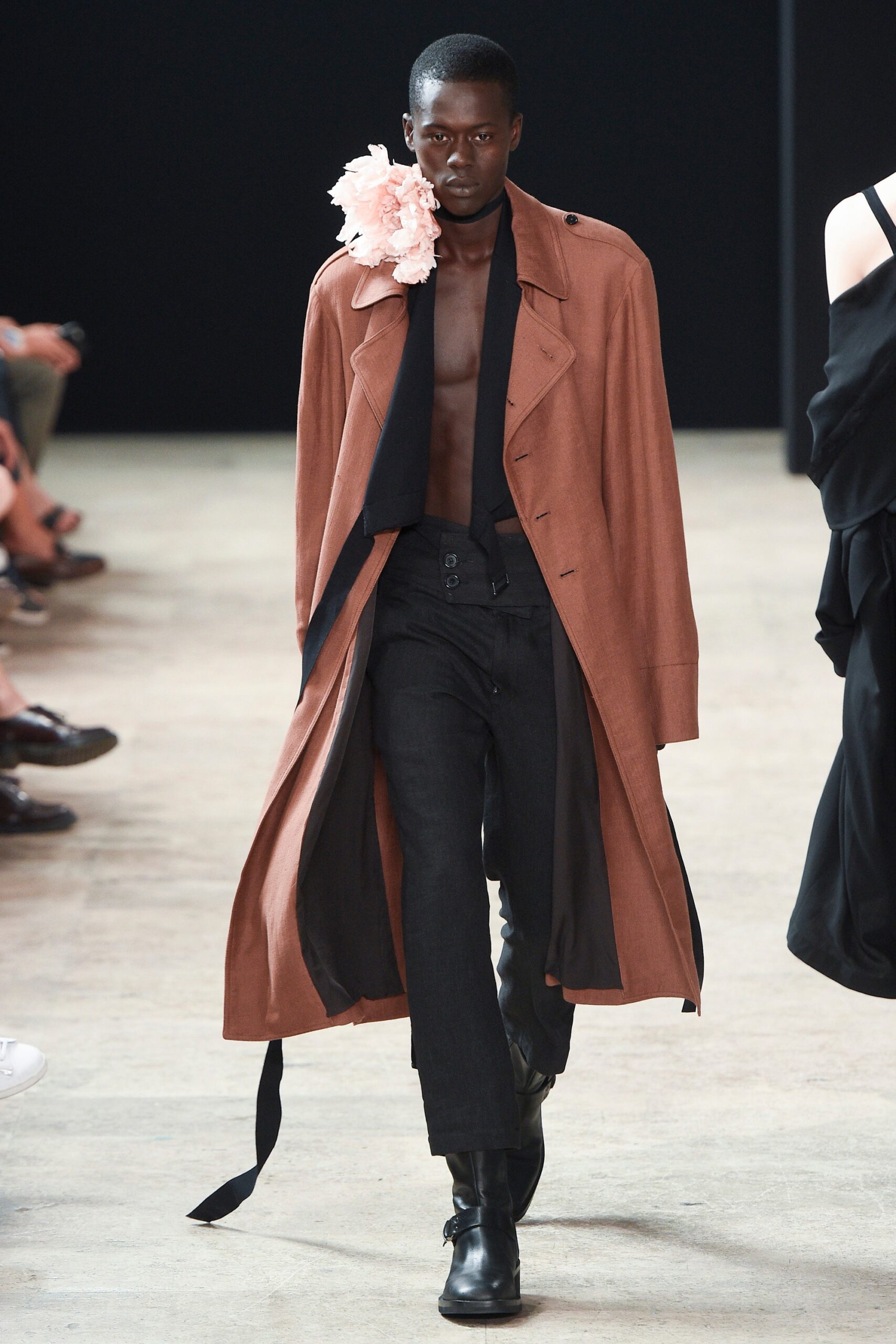 brown trench coat with black pants