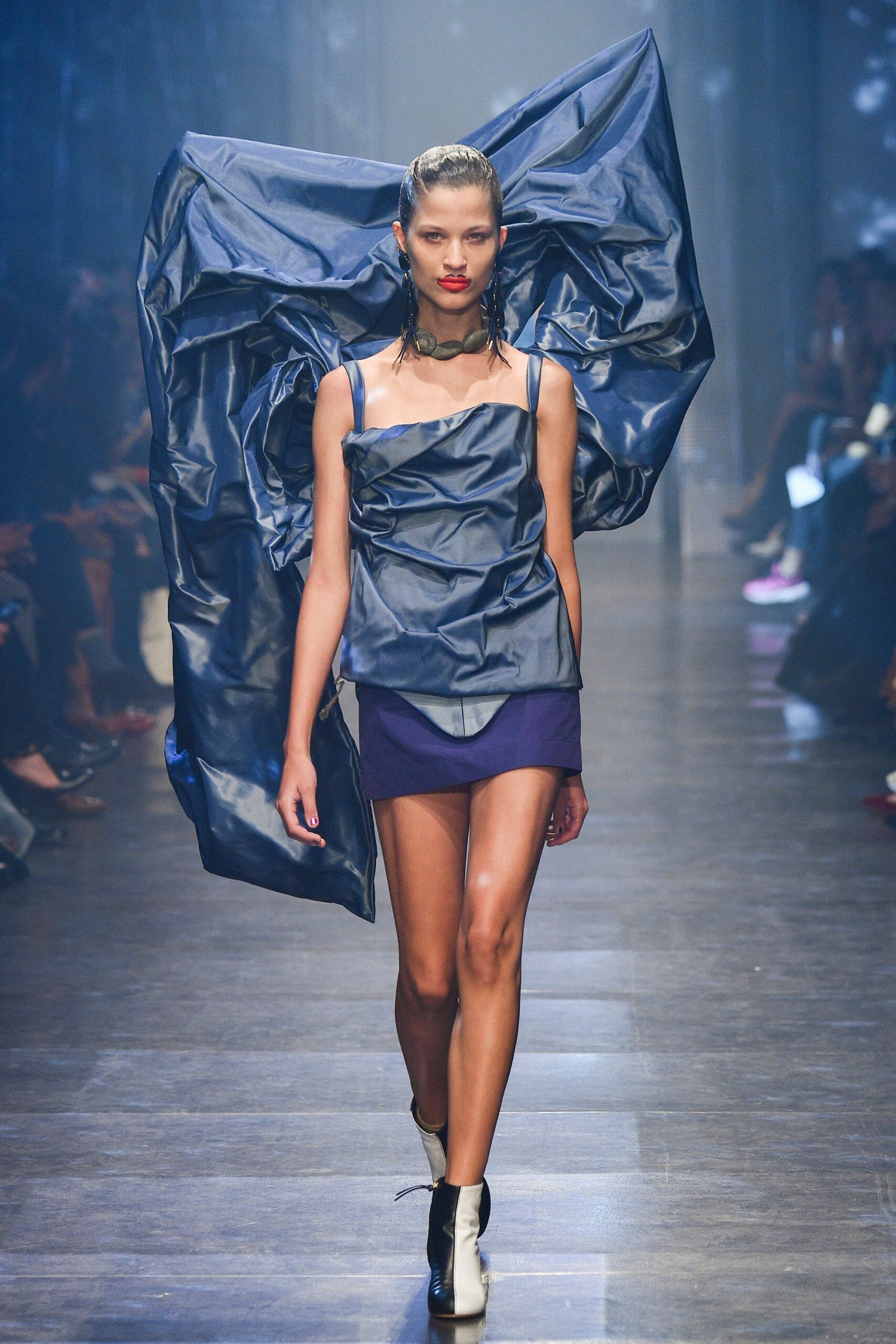 blue vinyl sleeveless dress with cape