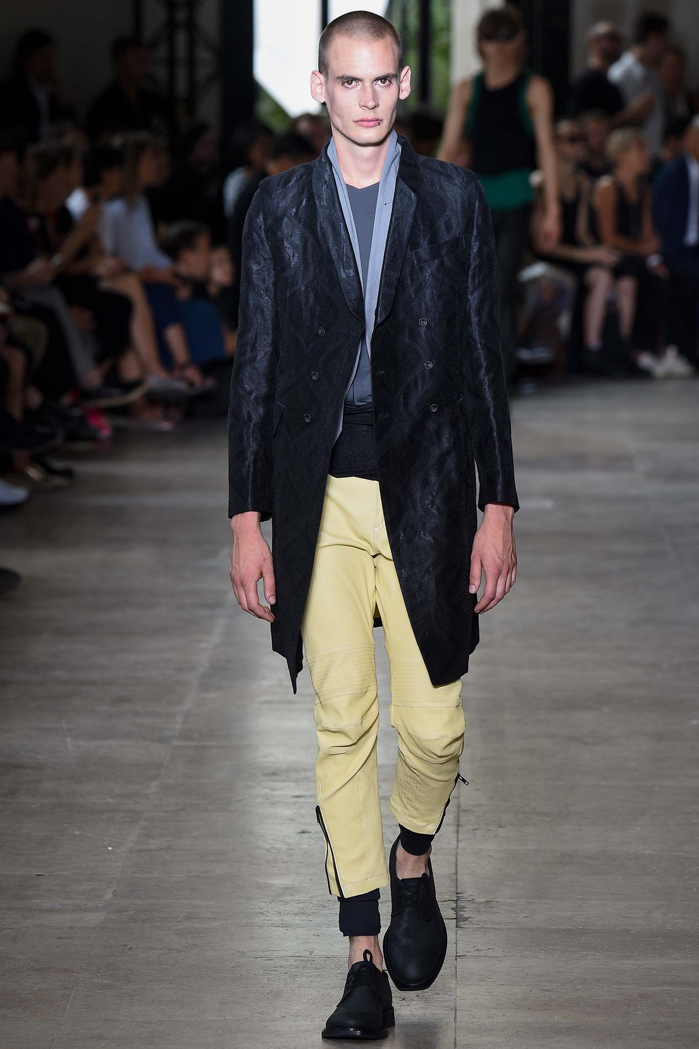 black coat yellow tailored pants