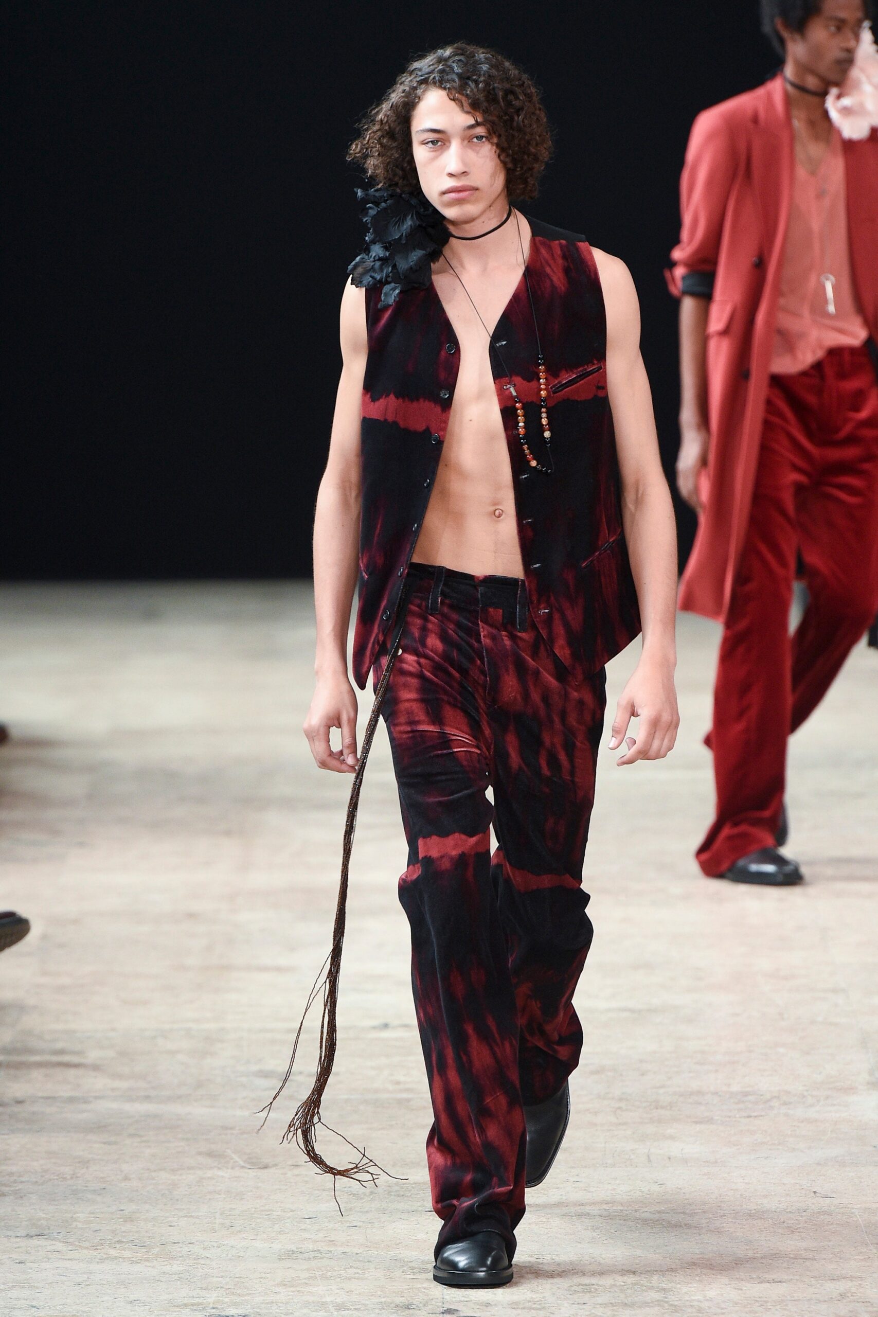 fitted black and red vest and pants