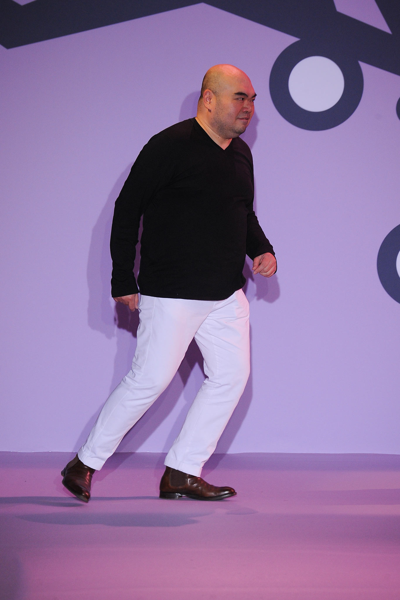 black shirt white pants