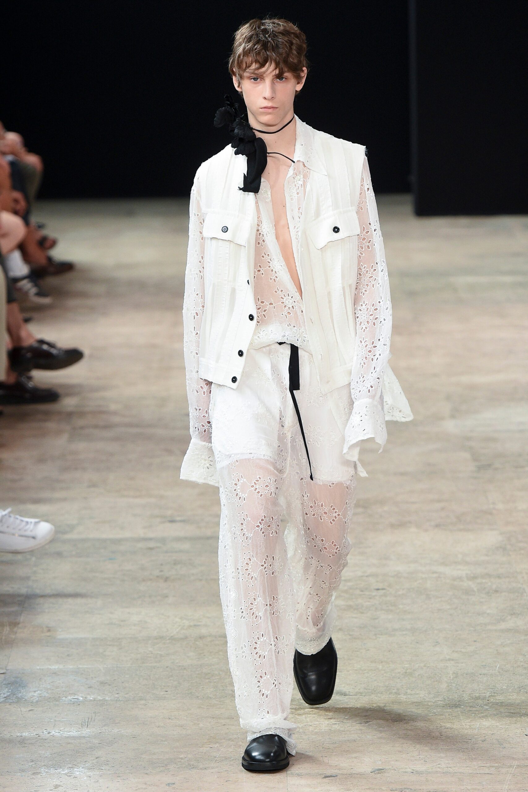 white embroidered shirt and pants