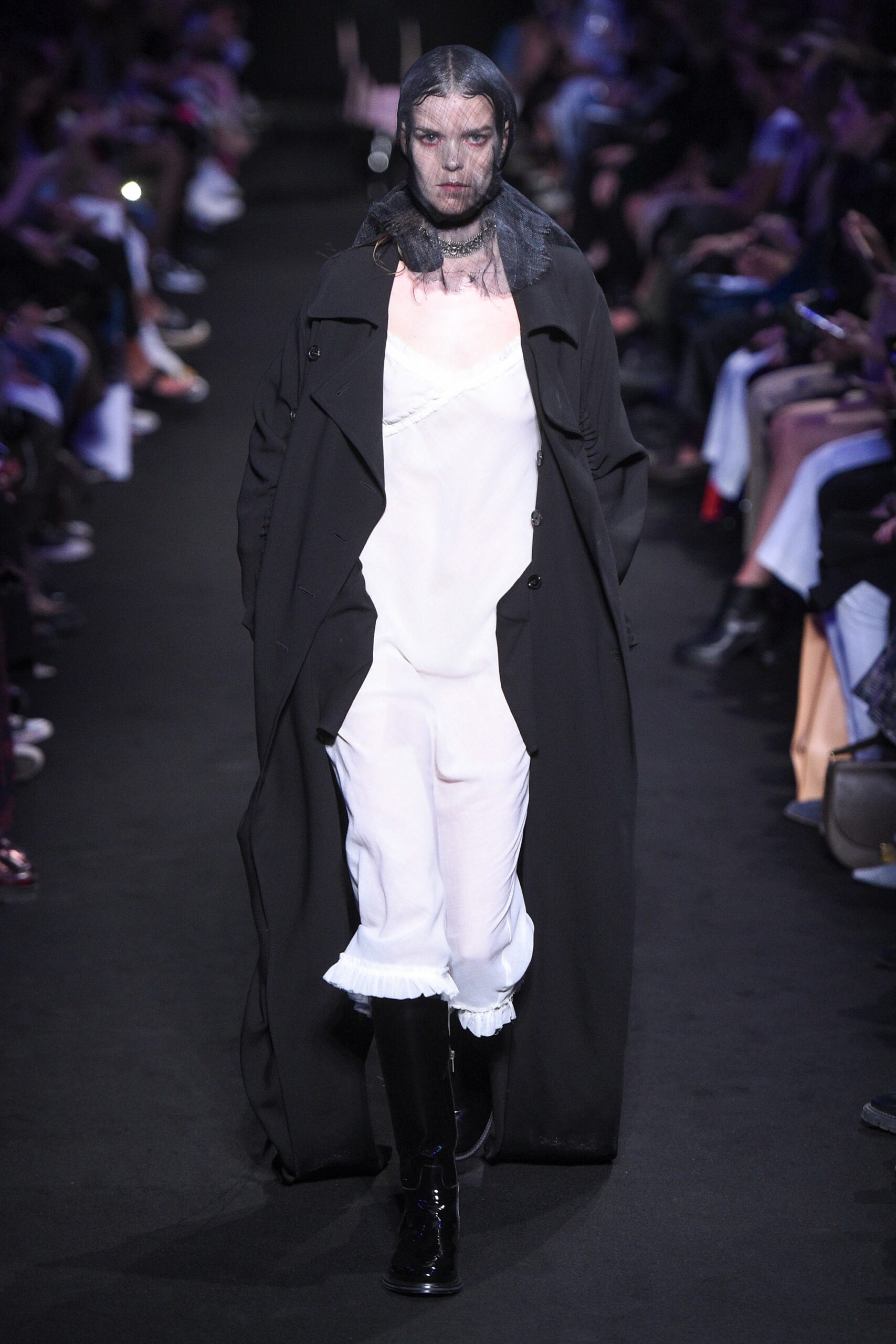 black wool coat and white dress