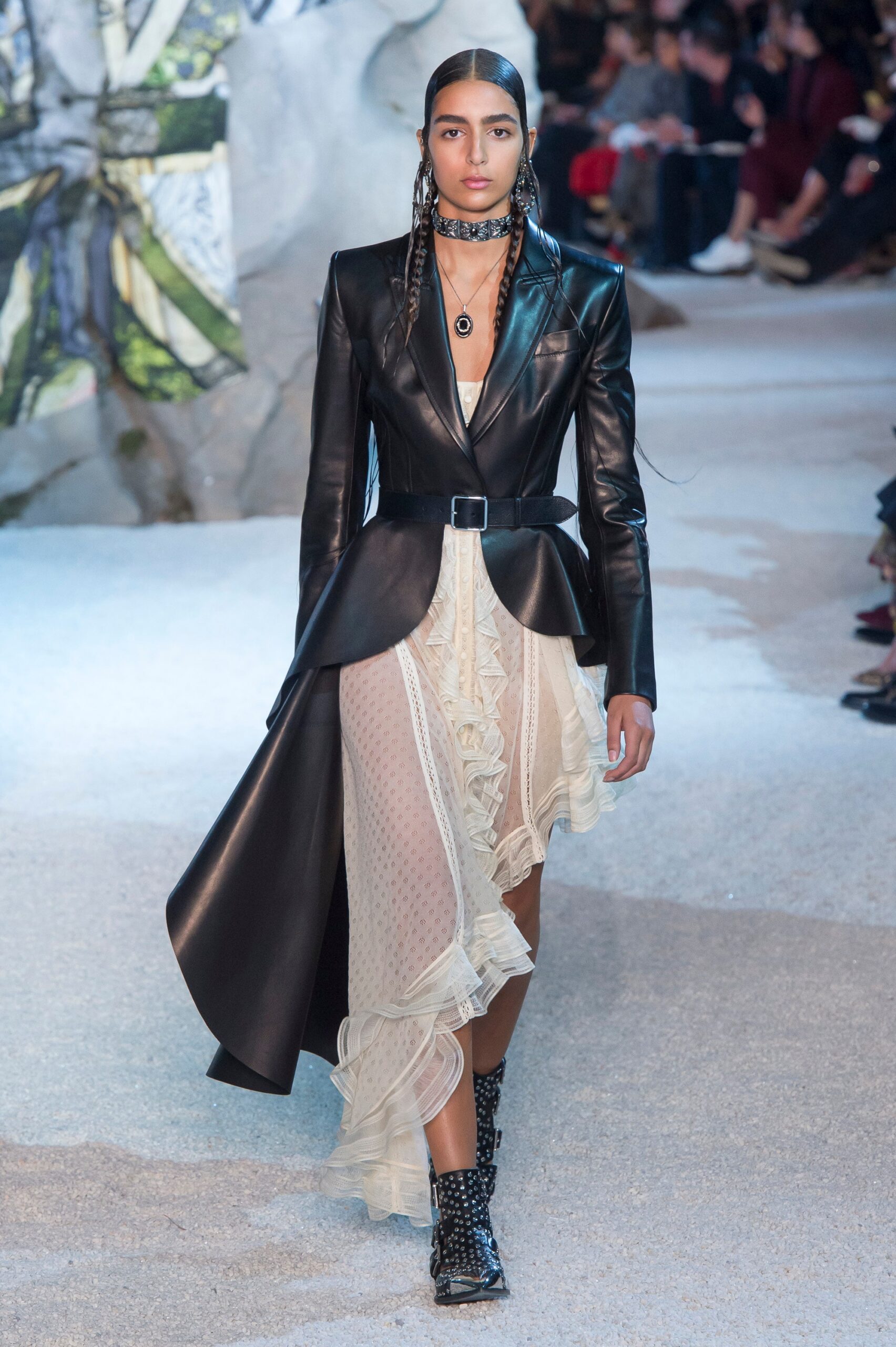 black leather coat and white ruffled dress