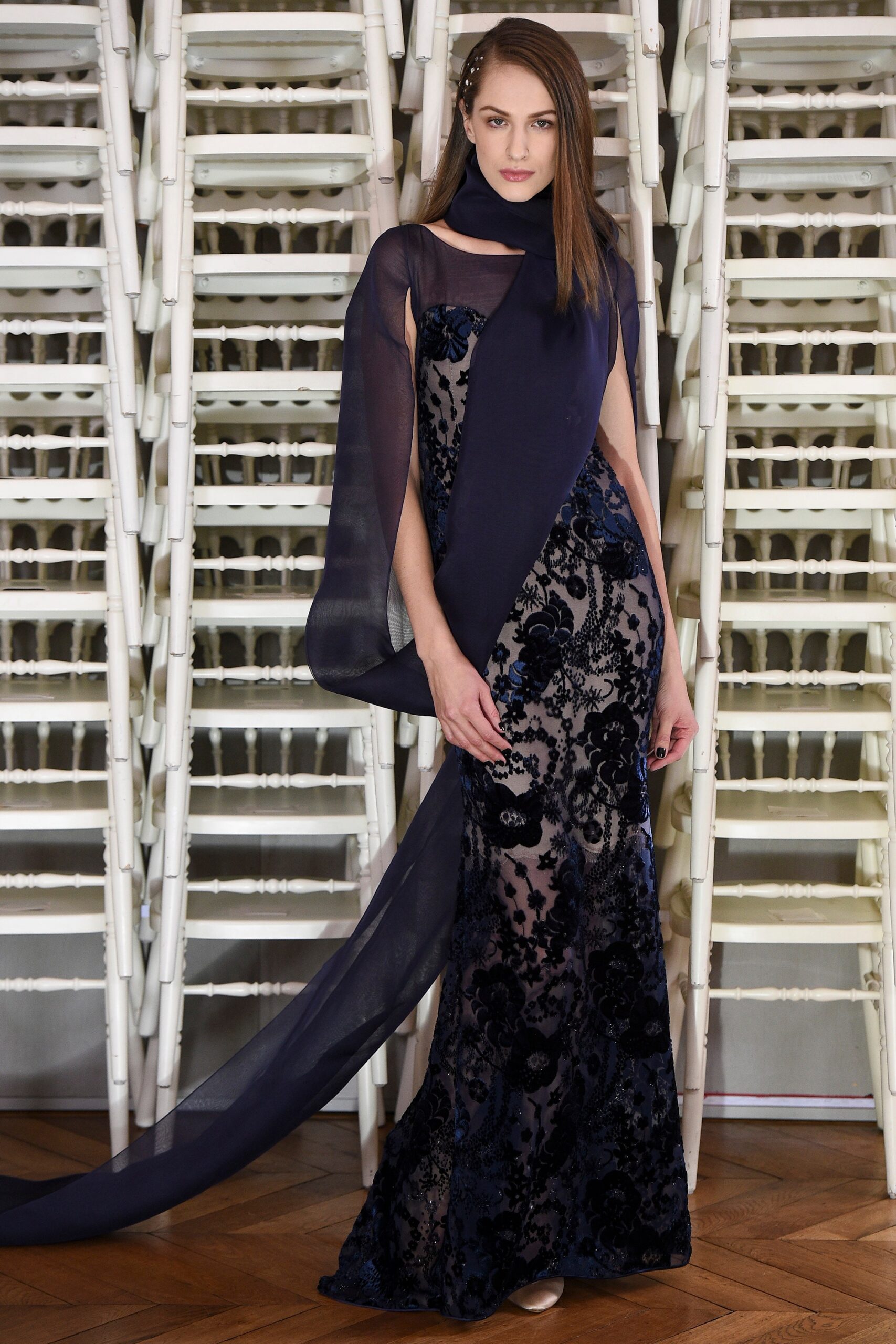 black and navy embroidered gown with cape