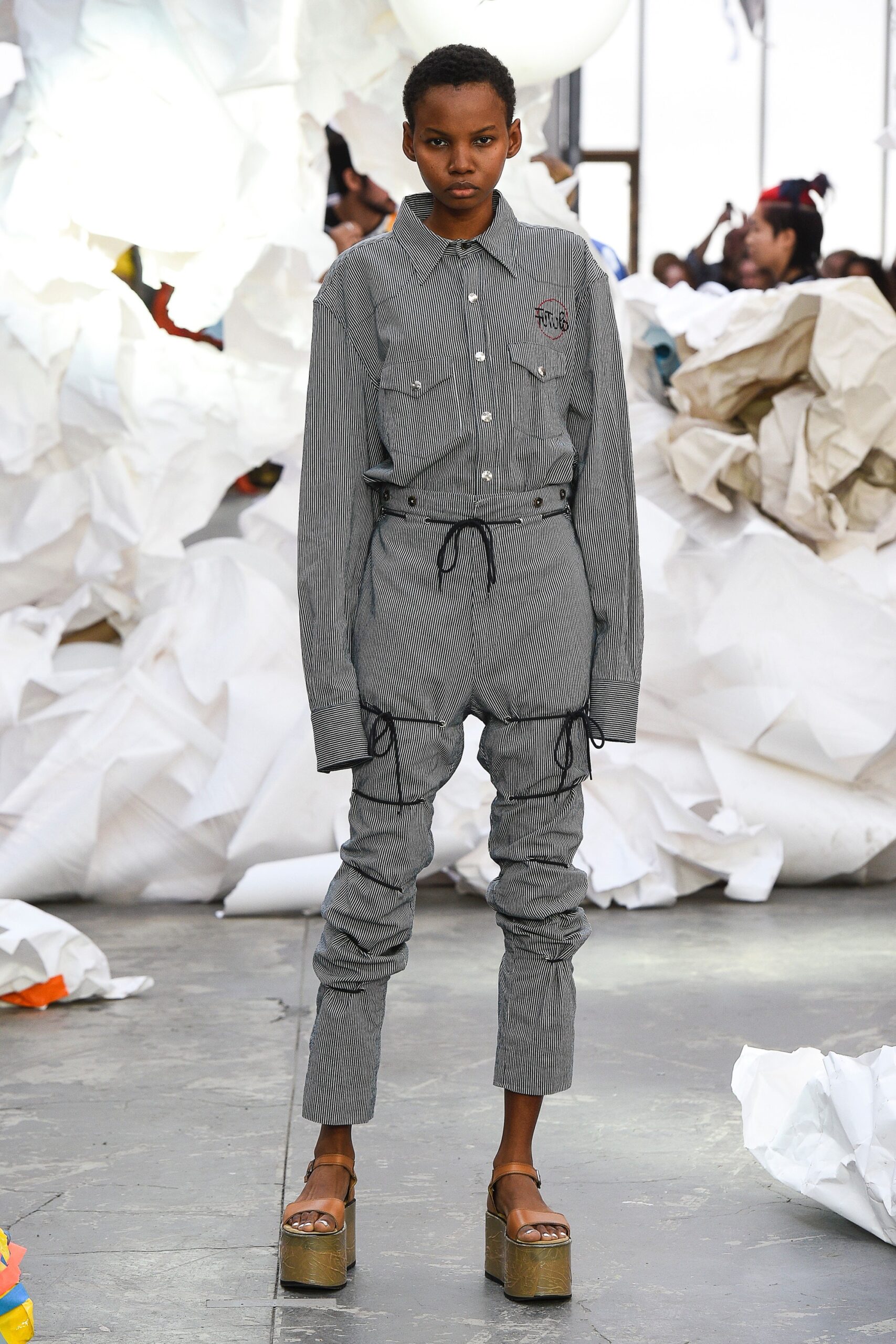gray cotton long-sleeve collared fitted zippered pockets jumpsuit