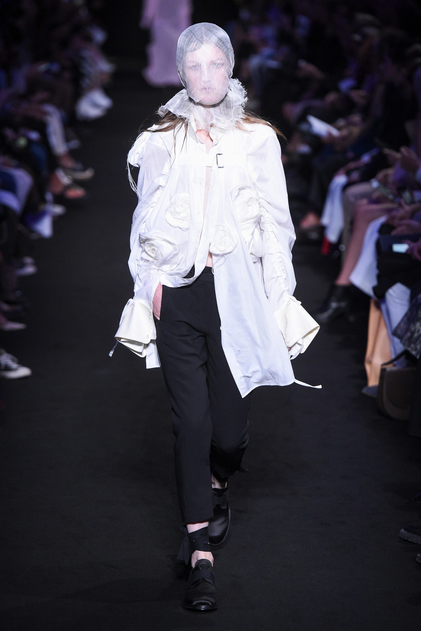white relaxed jacket with black pants