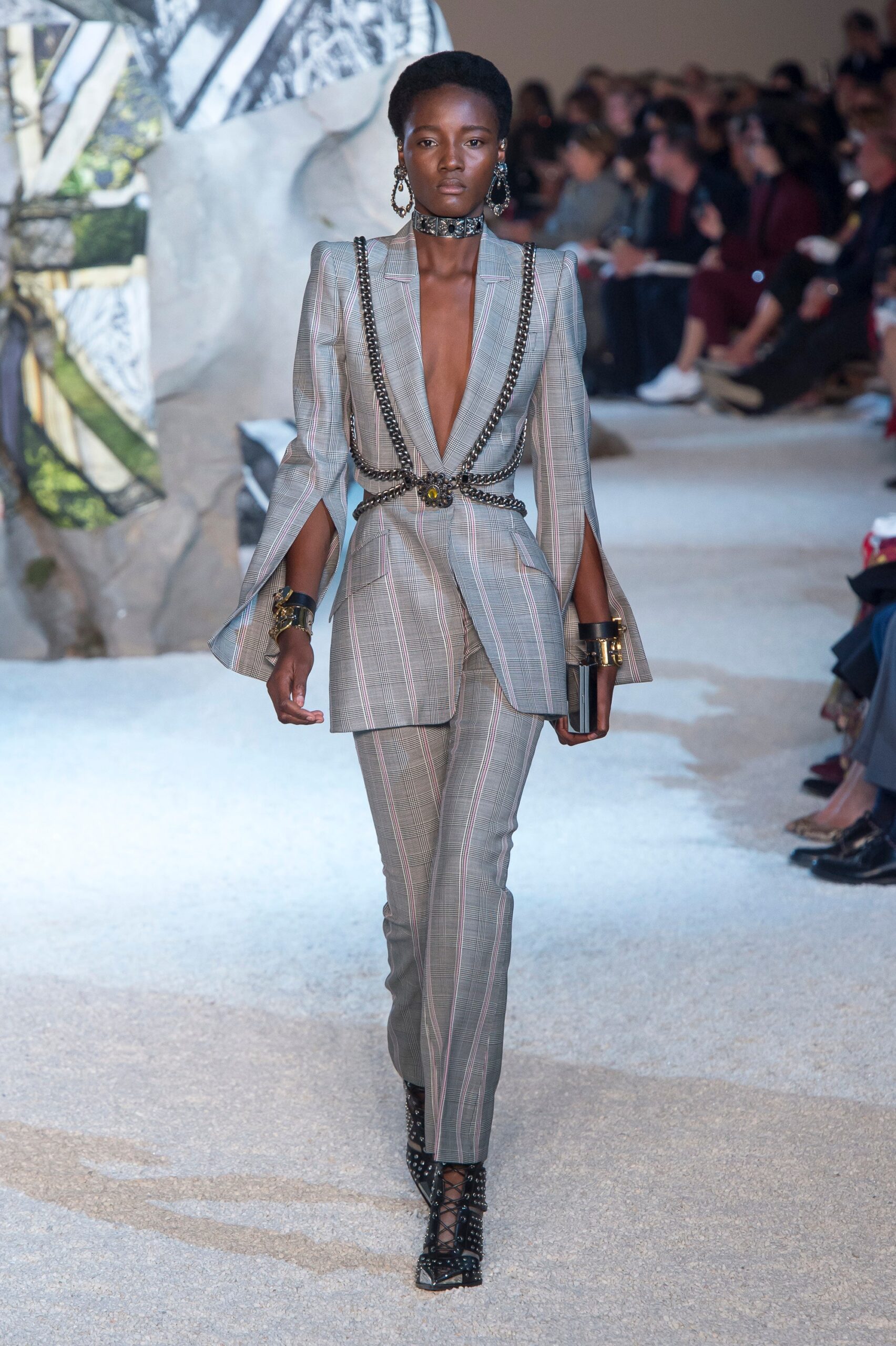 tailored gray suit with clutch