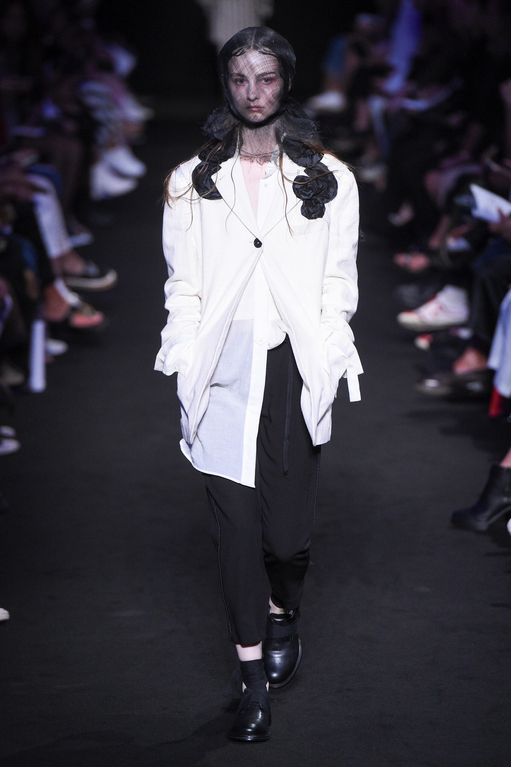 white relaxed jacket with black pants