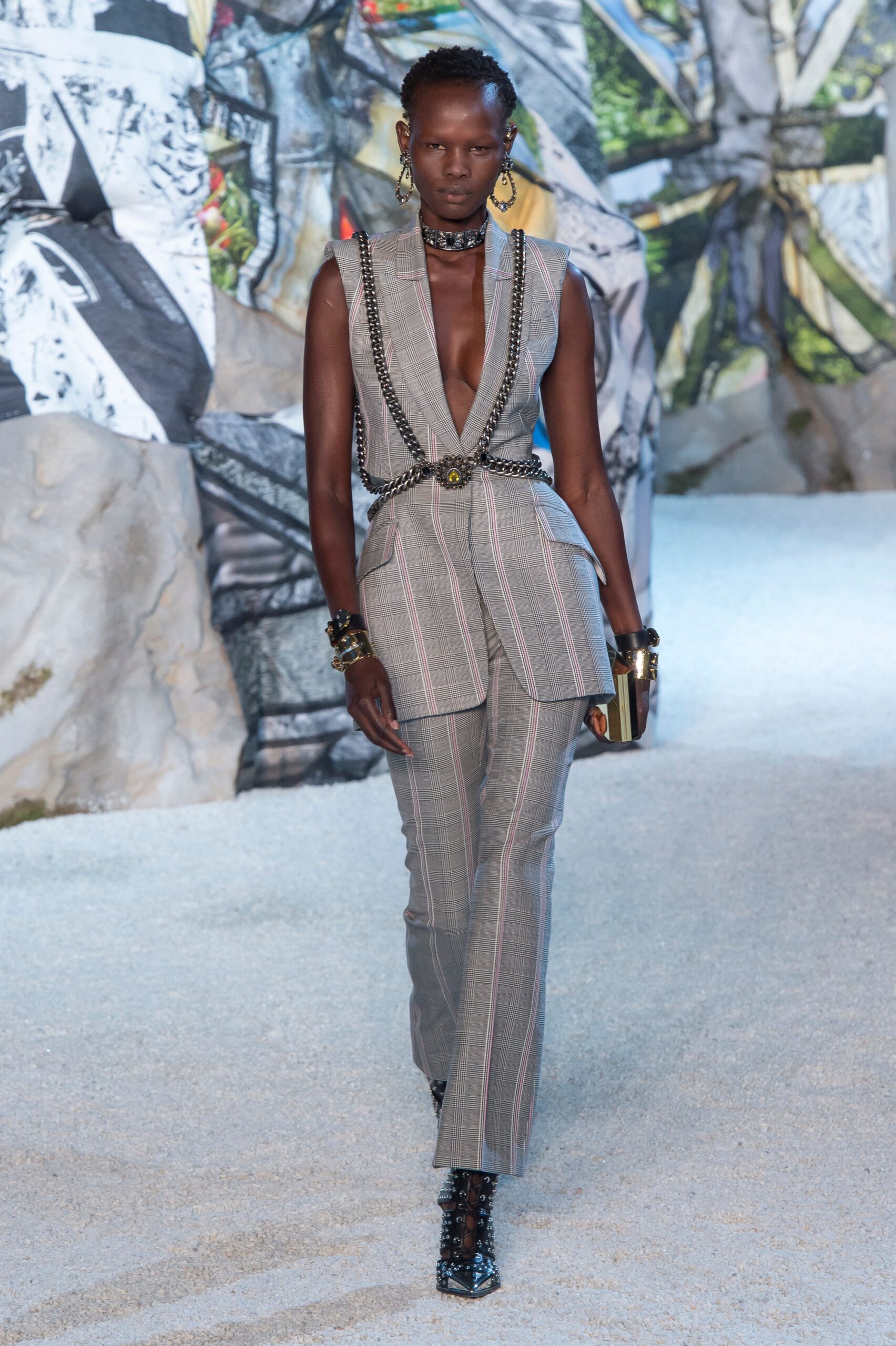 gray tailored suit with striped pants