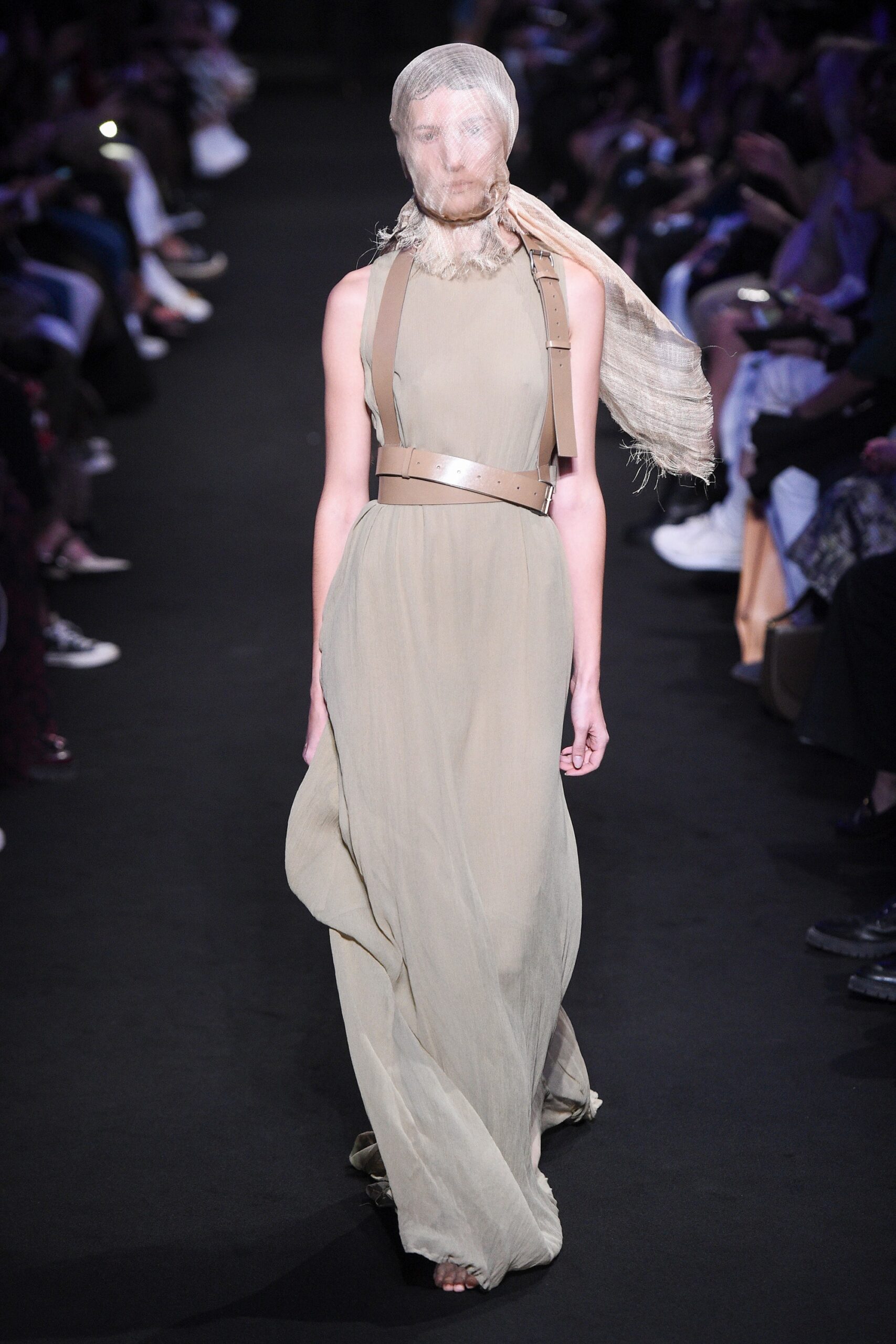 beige silk sleeveless high-neck fitted draped flowing gown