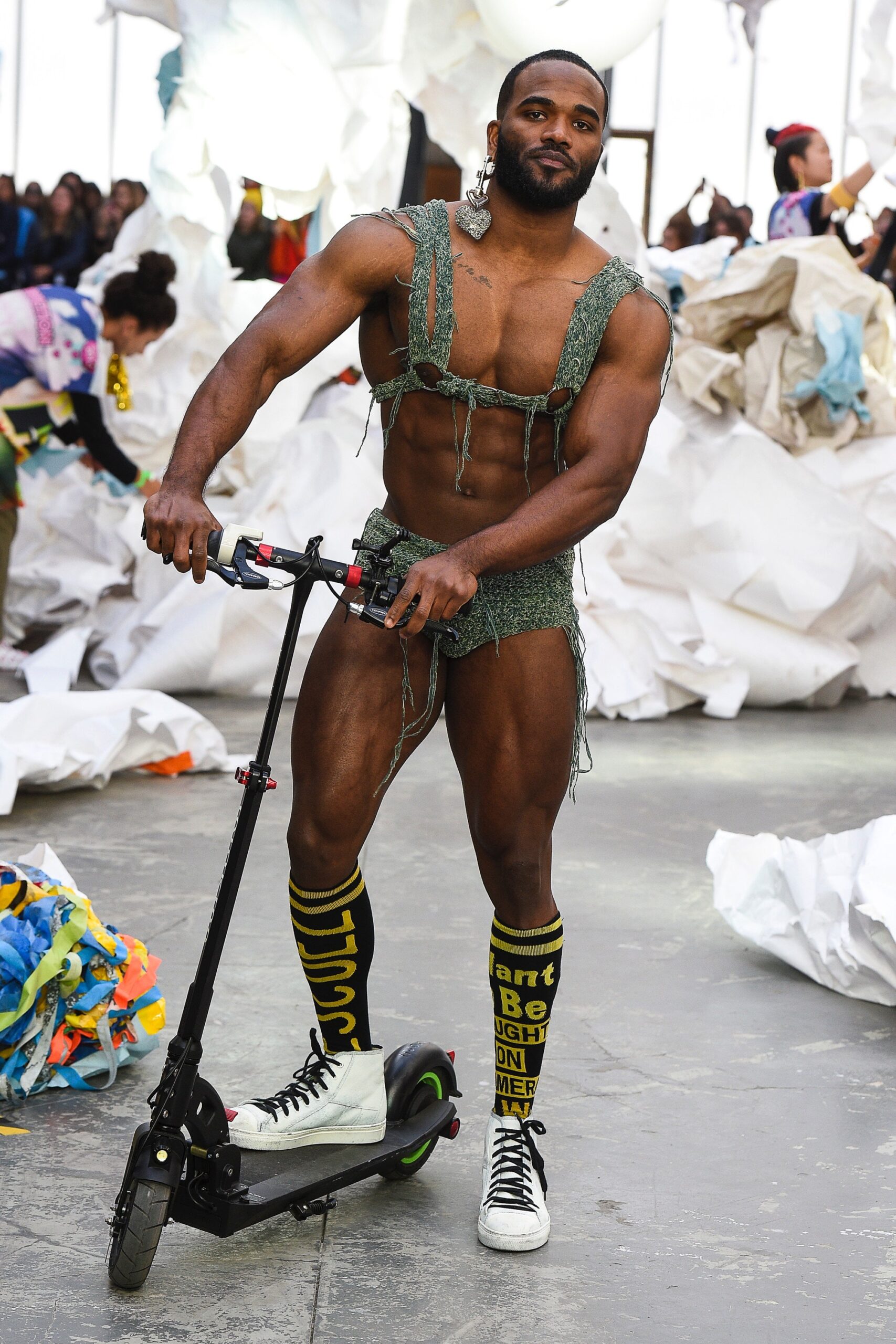 green fringed romper with yellow socks