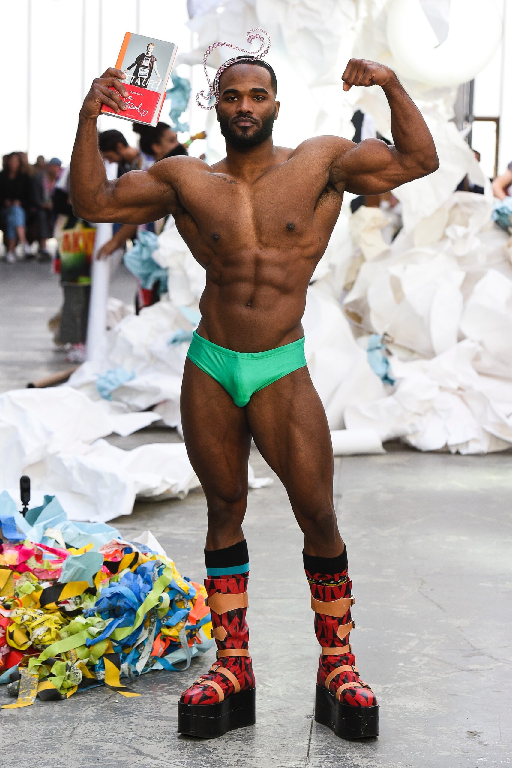 green swimsuit with platform shoes