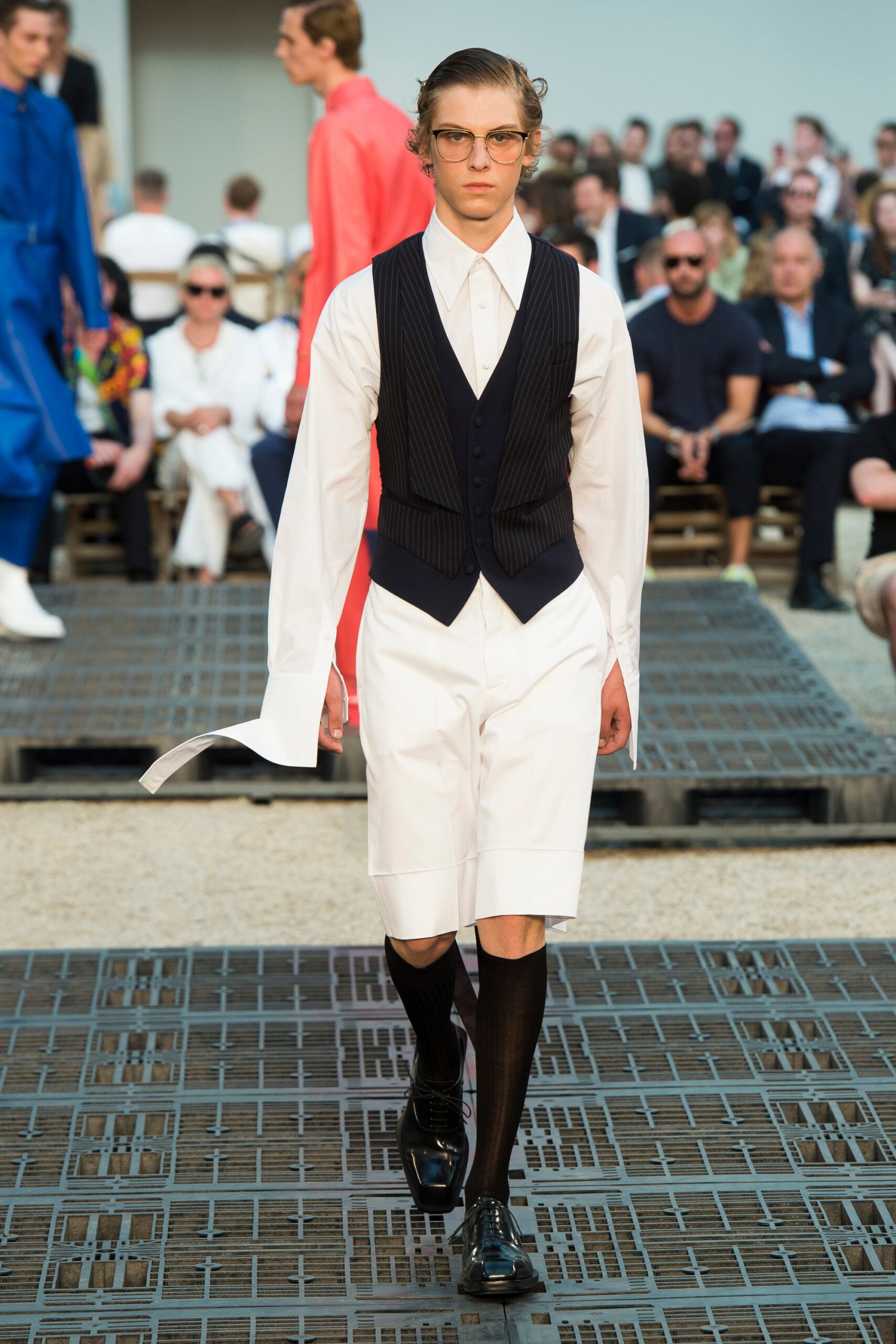 black vest white shirt shorts
