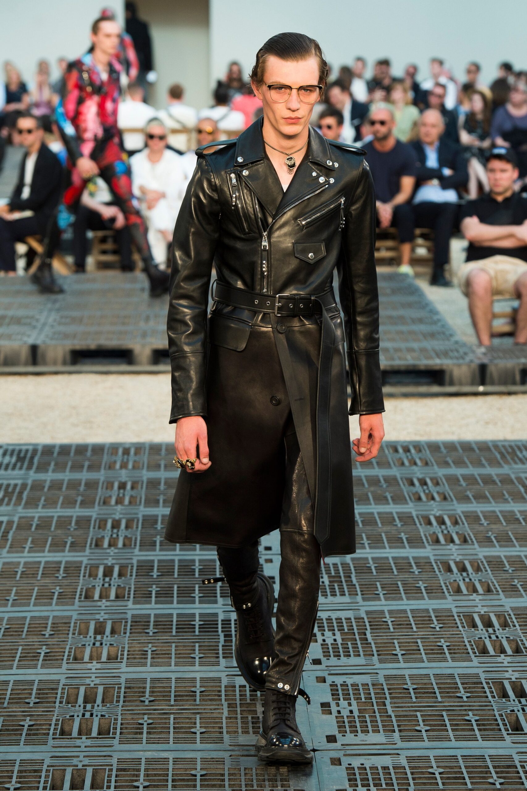 black leather long-sleeve collared fitted zippered belted coat