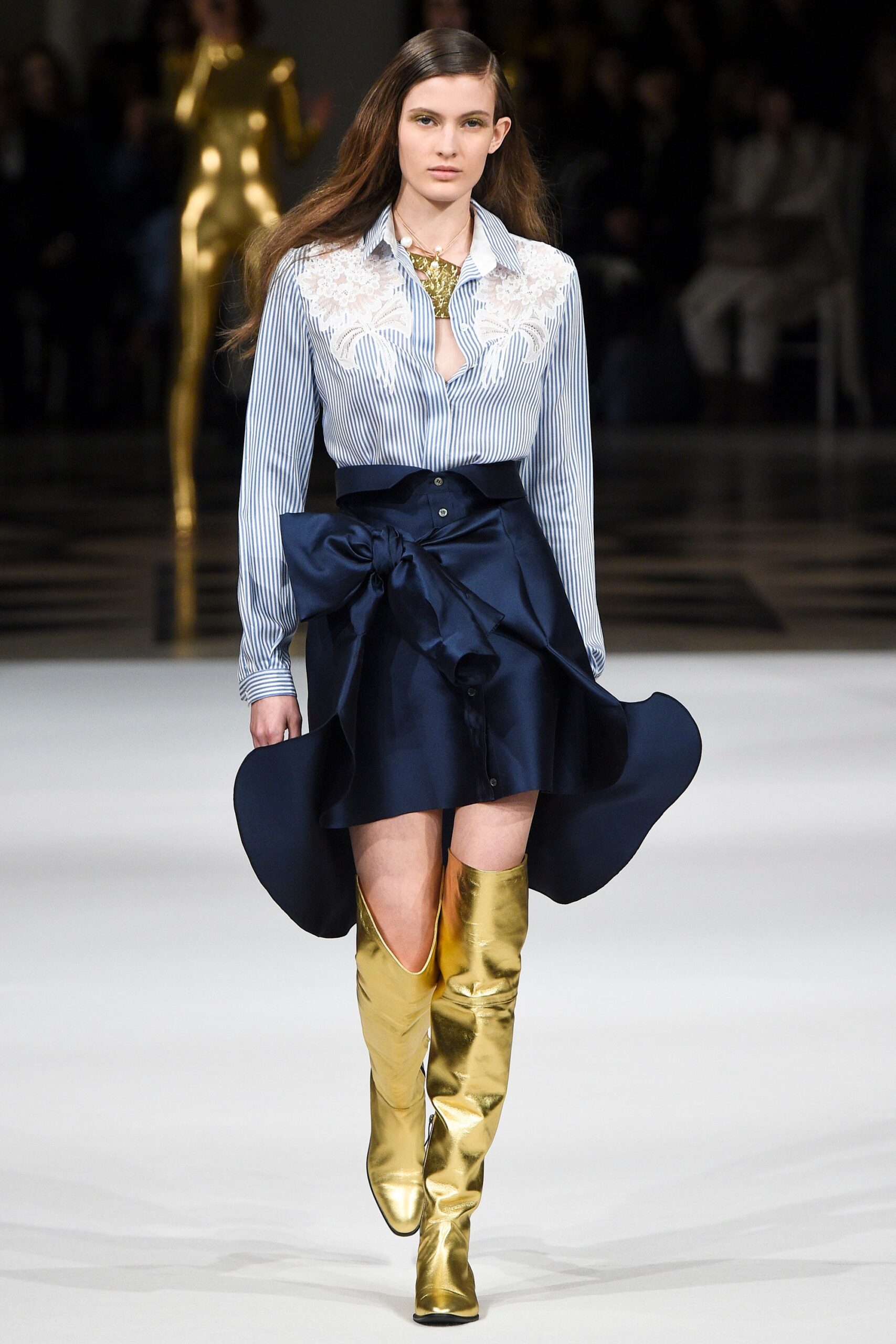 blue striped shirt navy skirt gold boots