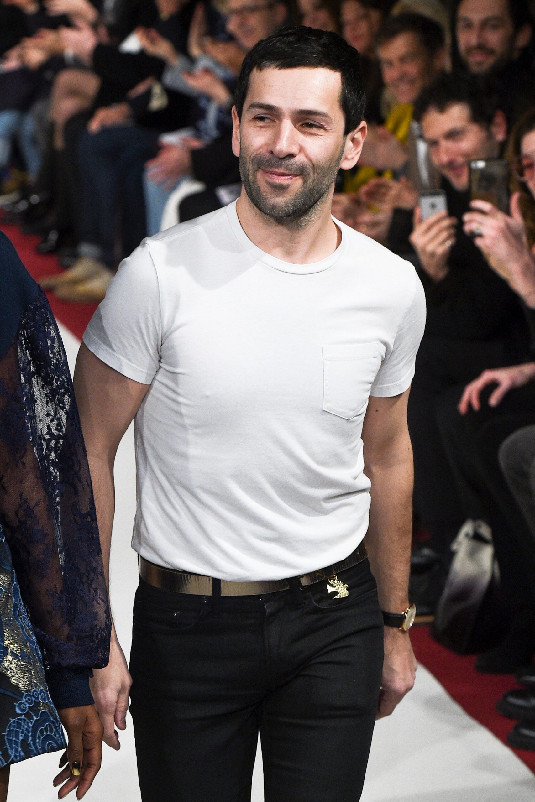 fitted white t-shirt and black pants