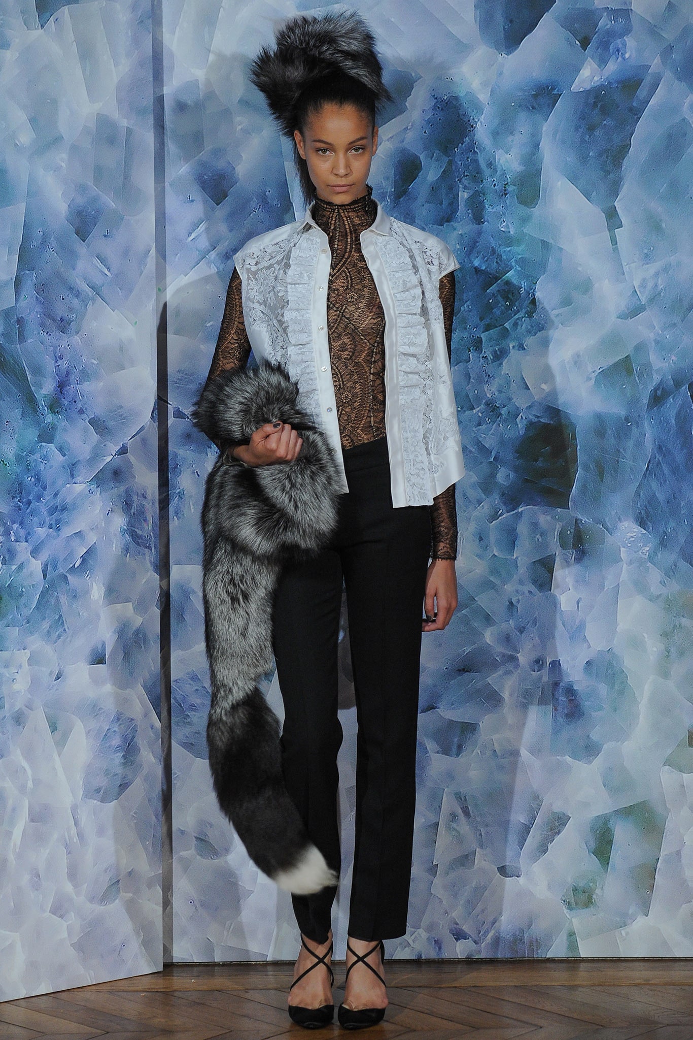 white silk fitted top with black tailored pants