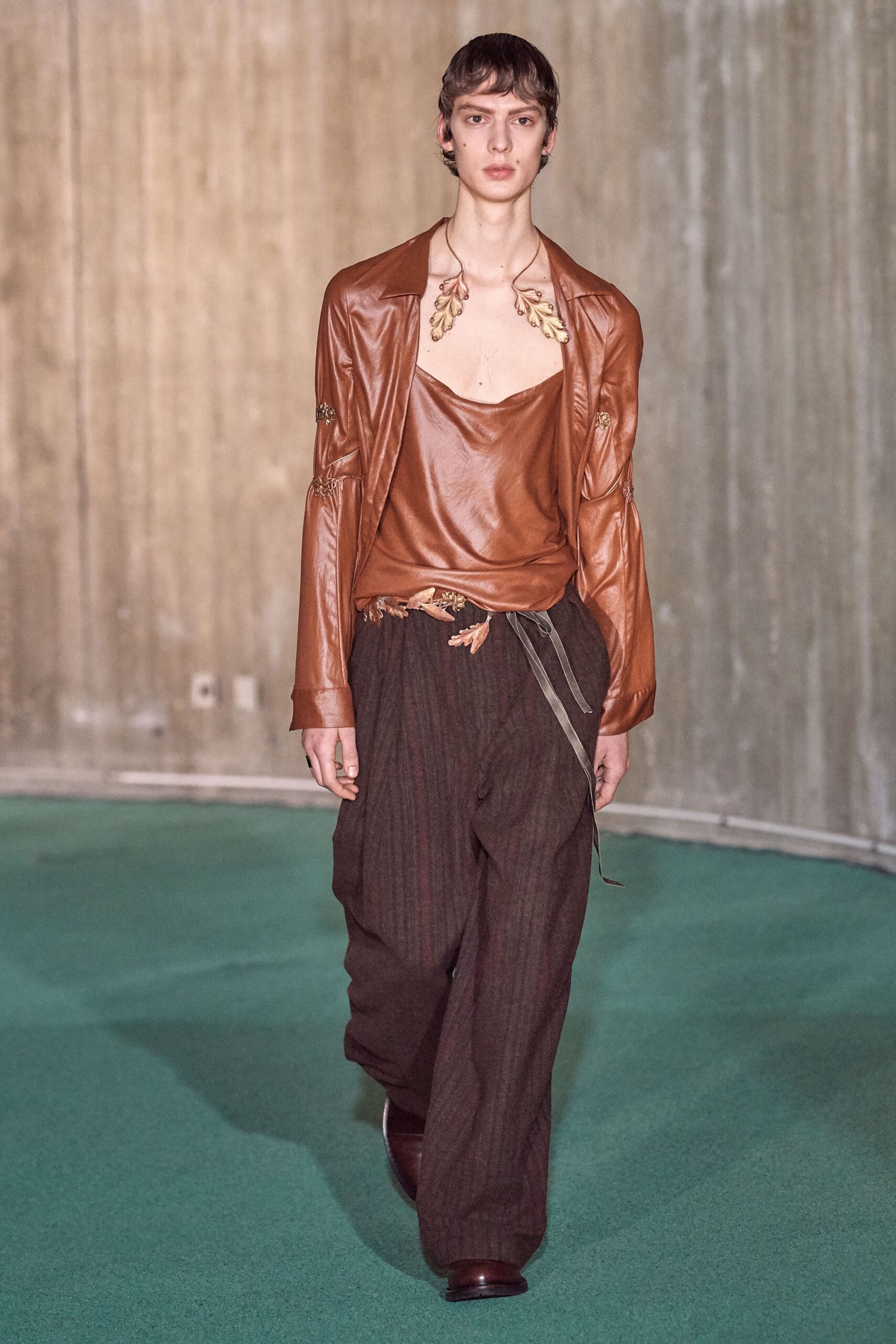 brown leather top and relaxed pants