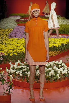 fitted orange dress with hat