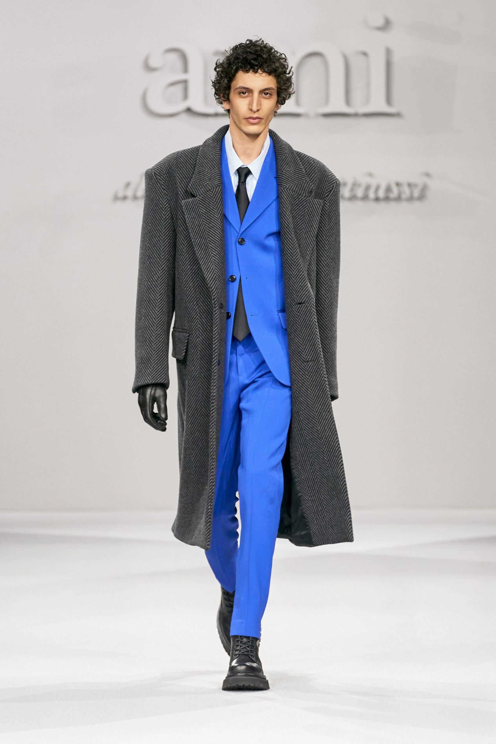 gray wool coat with blue suit