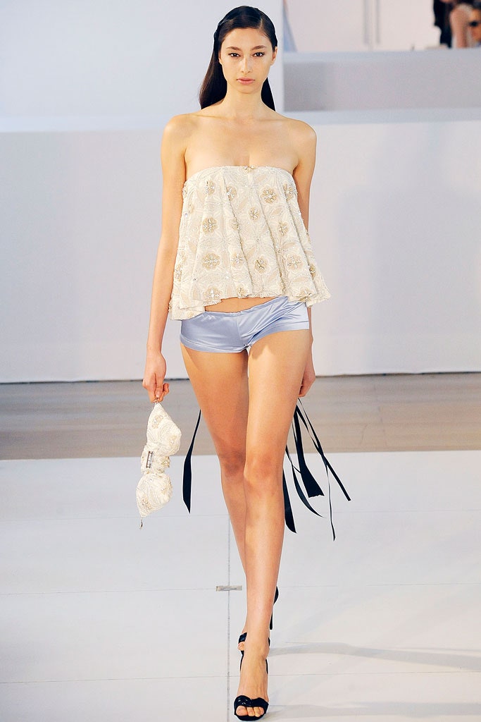 white silk sleeveless strapless relaxed pleated top